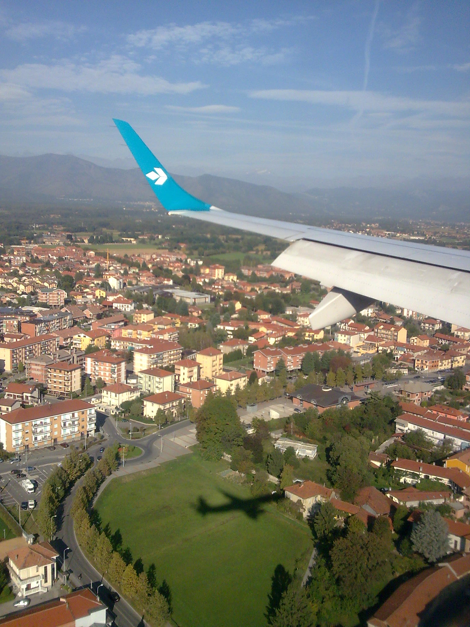 Dall'aereo - ombra riflessa sulla città