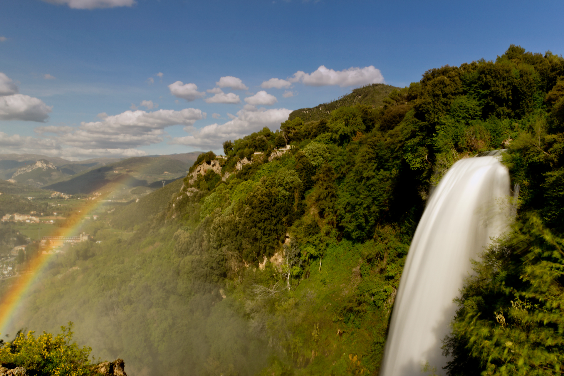 Sheet of water and bow of colors