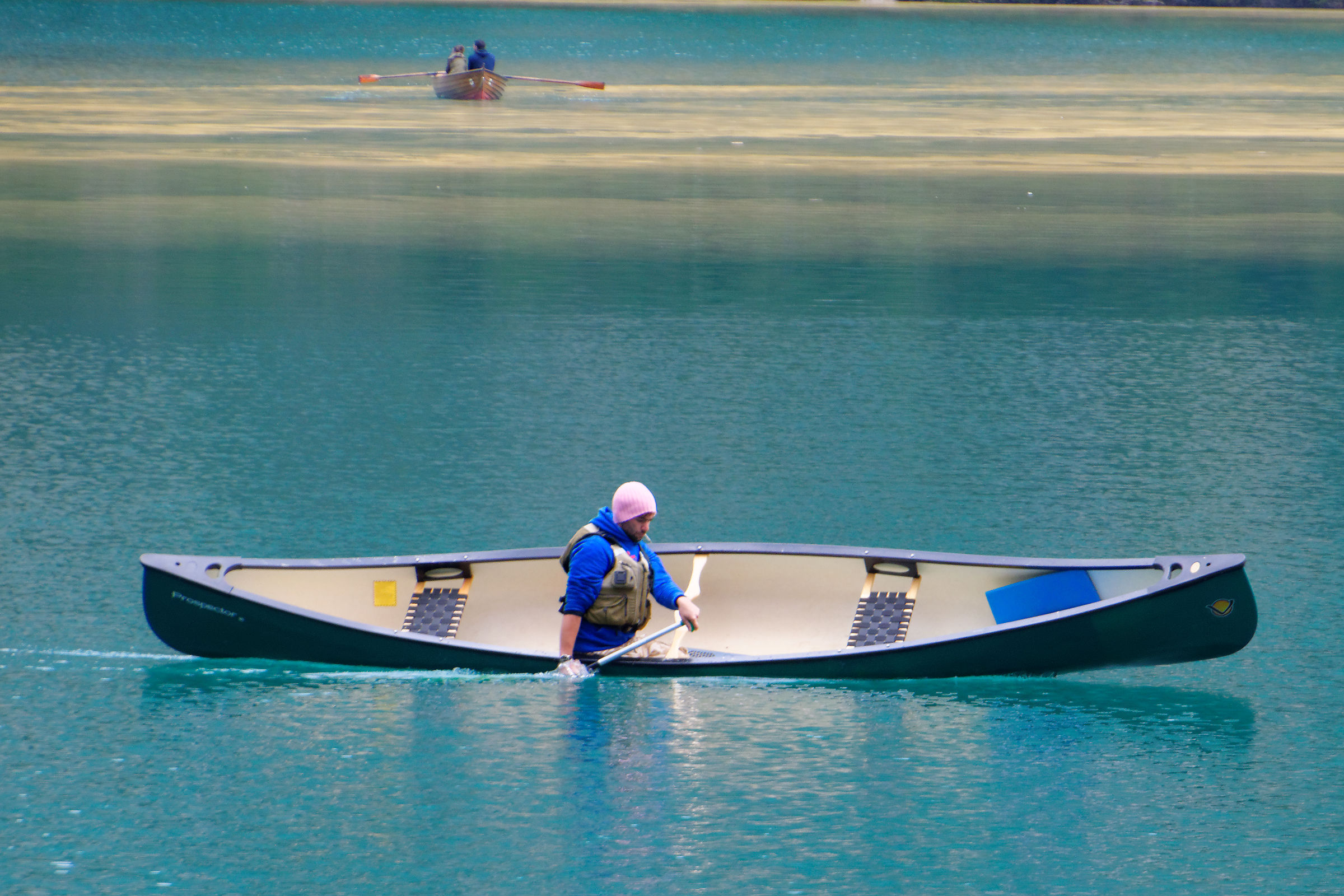 paddling with the pink cap
