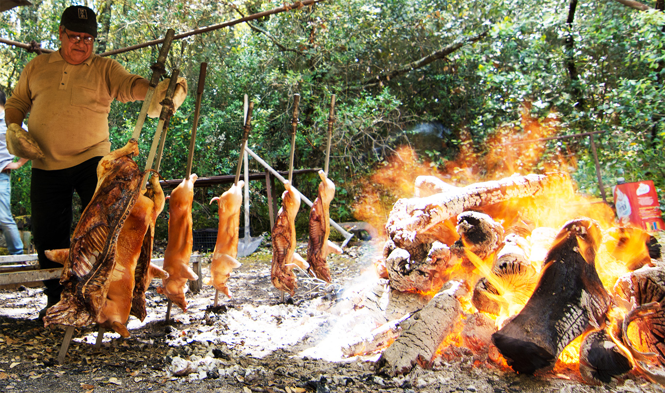 Sardinia - cooking piglets high heat