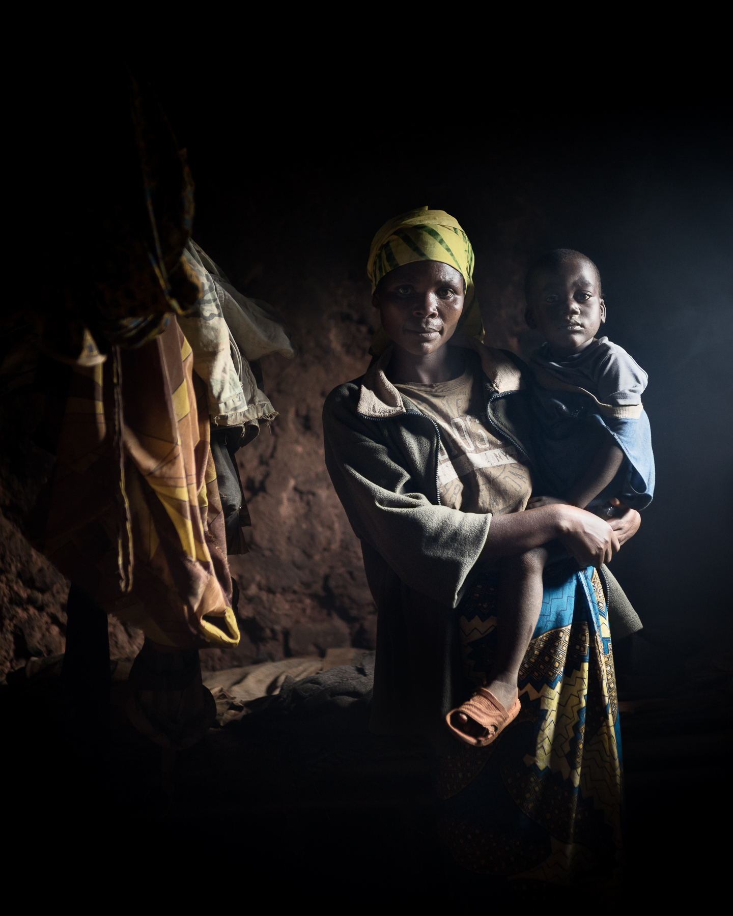 Batwa mother with child within their abitaz