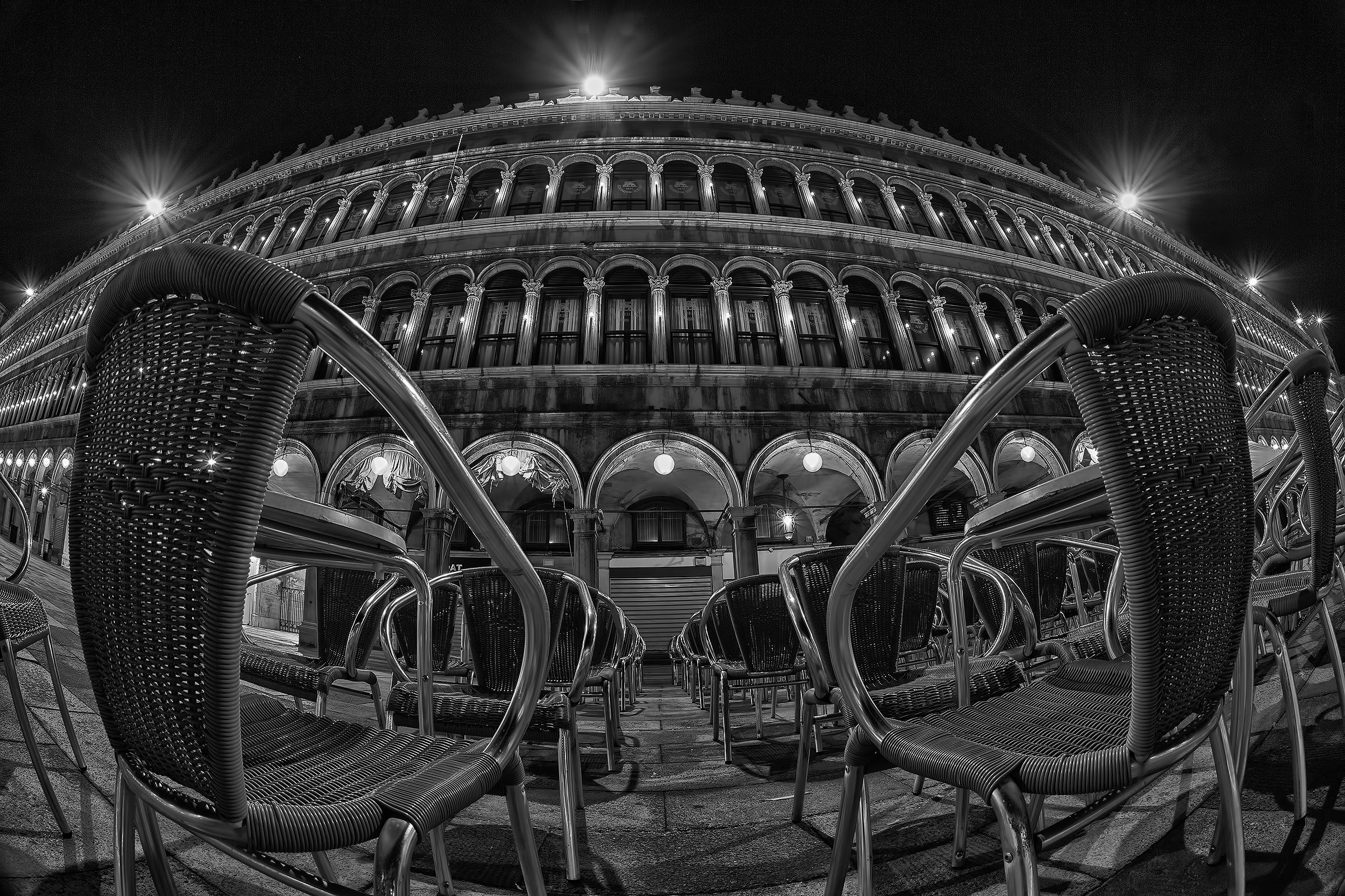 Please have a seat that is Venice by night B / W