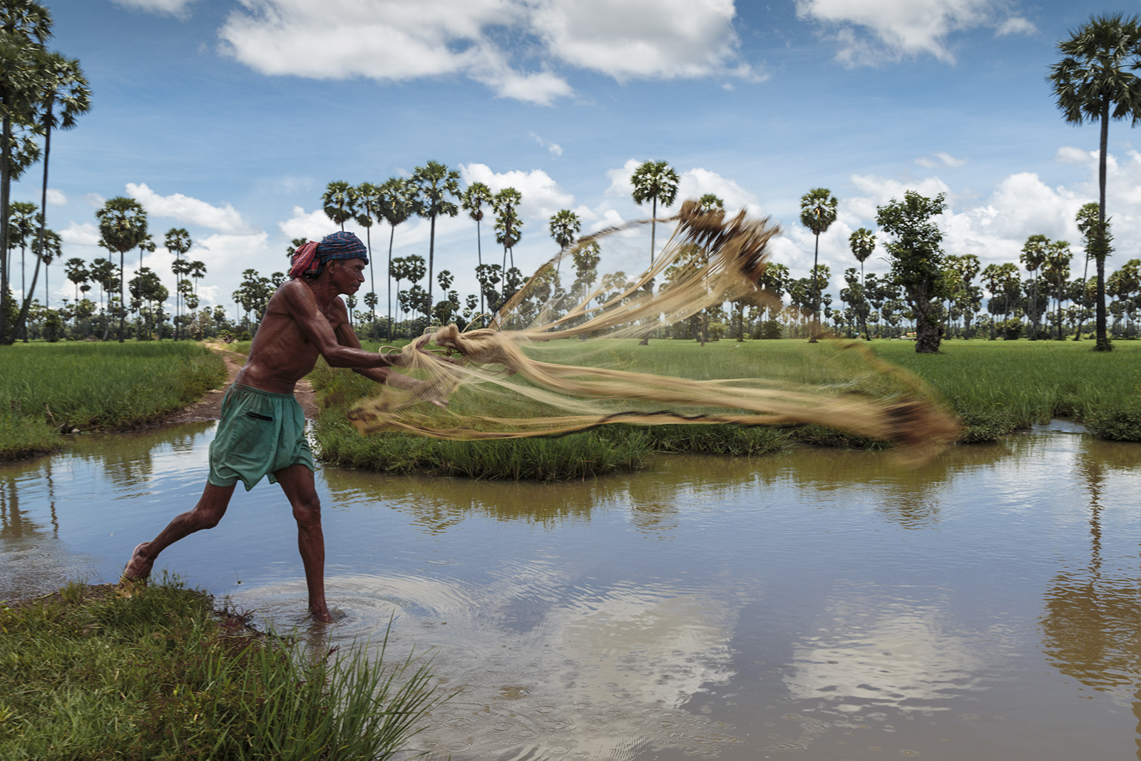 Il pescatore con la rete