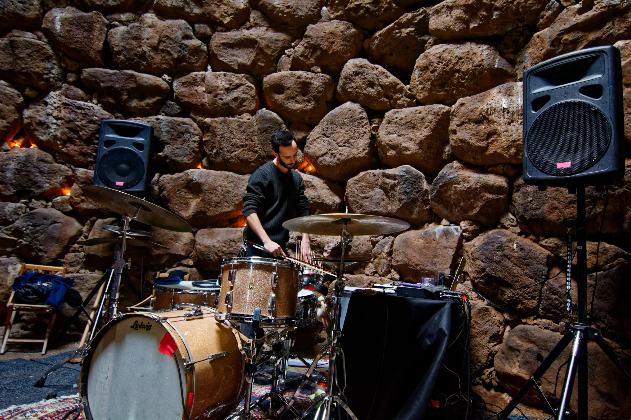 the drummer in the dolmen with the violin bow