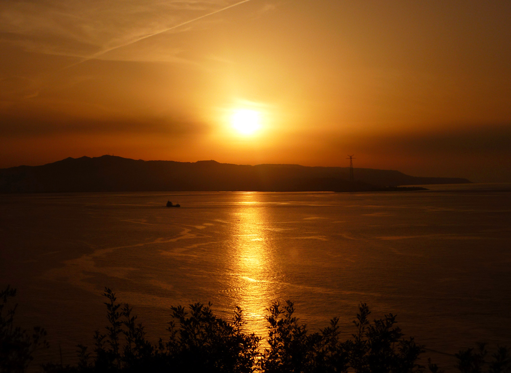 Golden sunset over the Strait of Messina