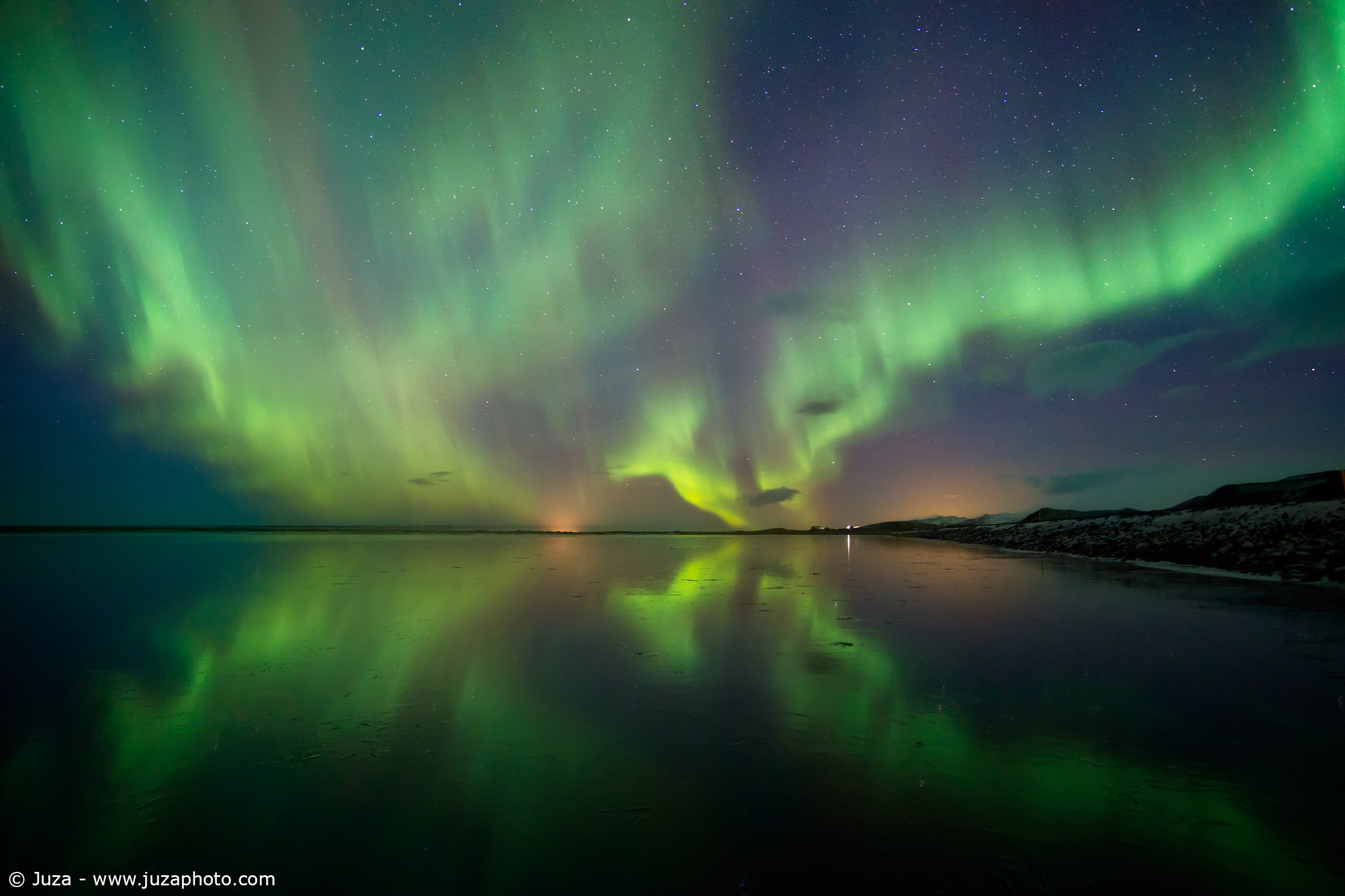 Aurora Borealis on the frozen lake
