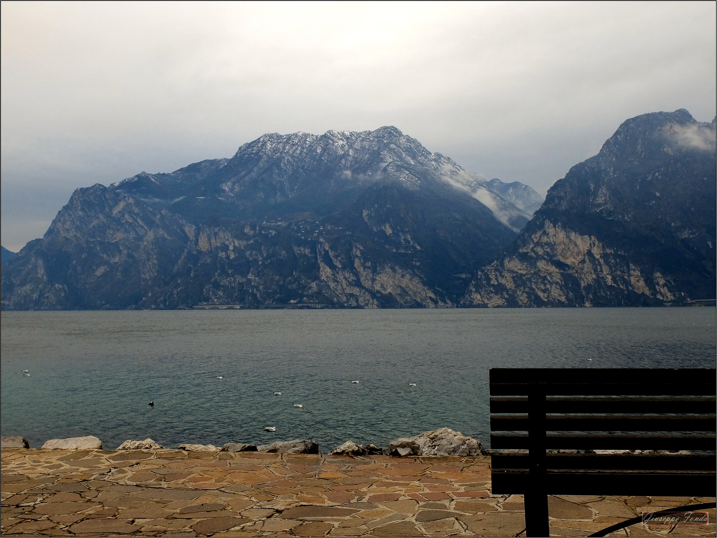 The snow on the peaks Torbole Tn.