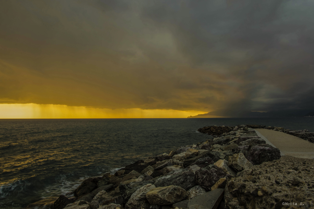Storm in the sunset, the Gulf of Tigullio