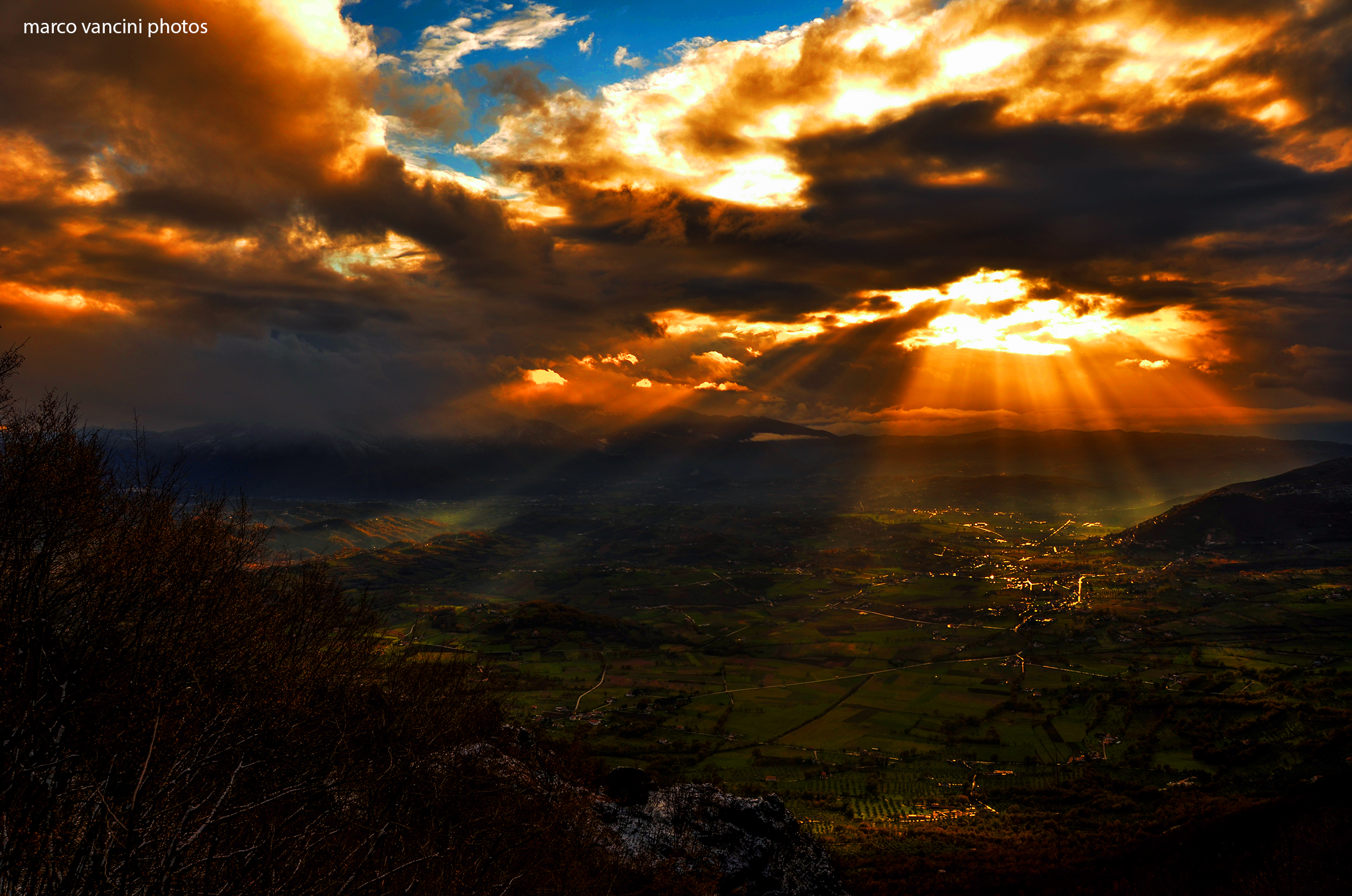A valley lit by the sun's rays
