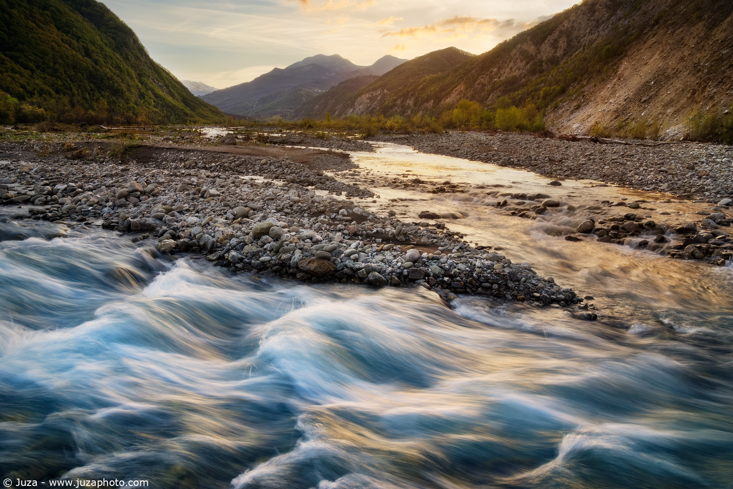 Sunset over the river Secchia