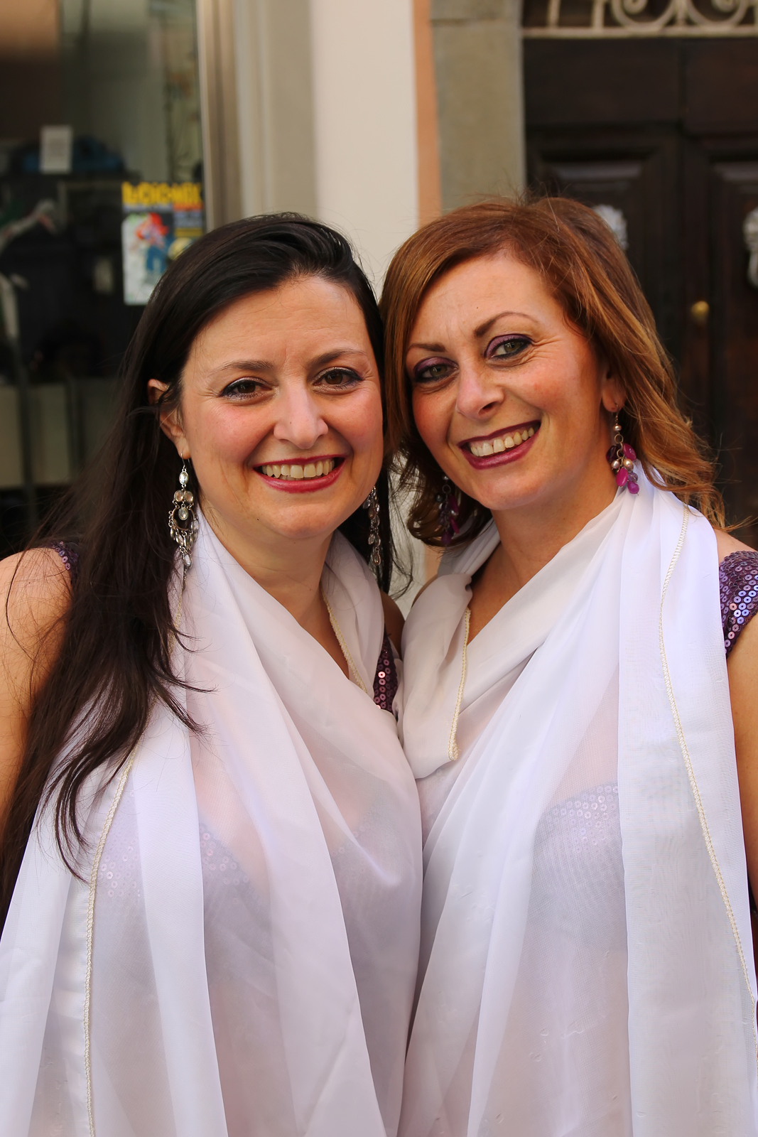 Two friends together smiling