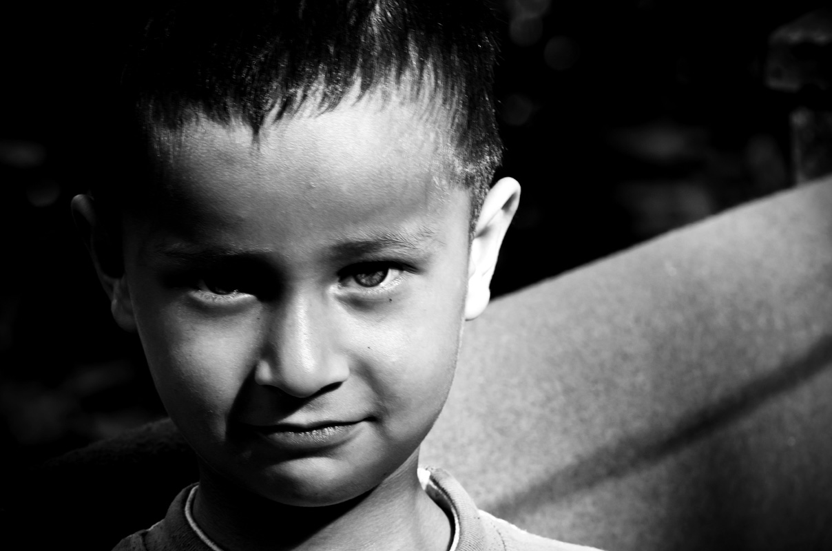 child looks at the lens