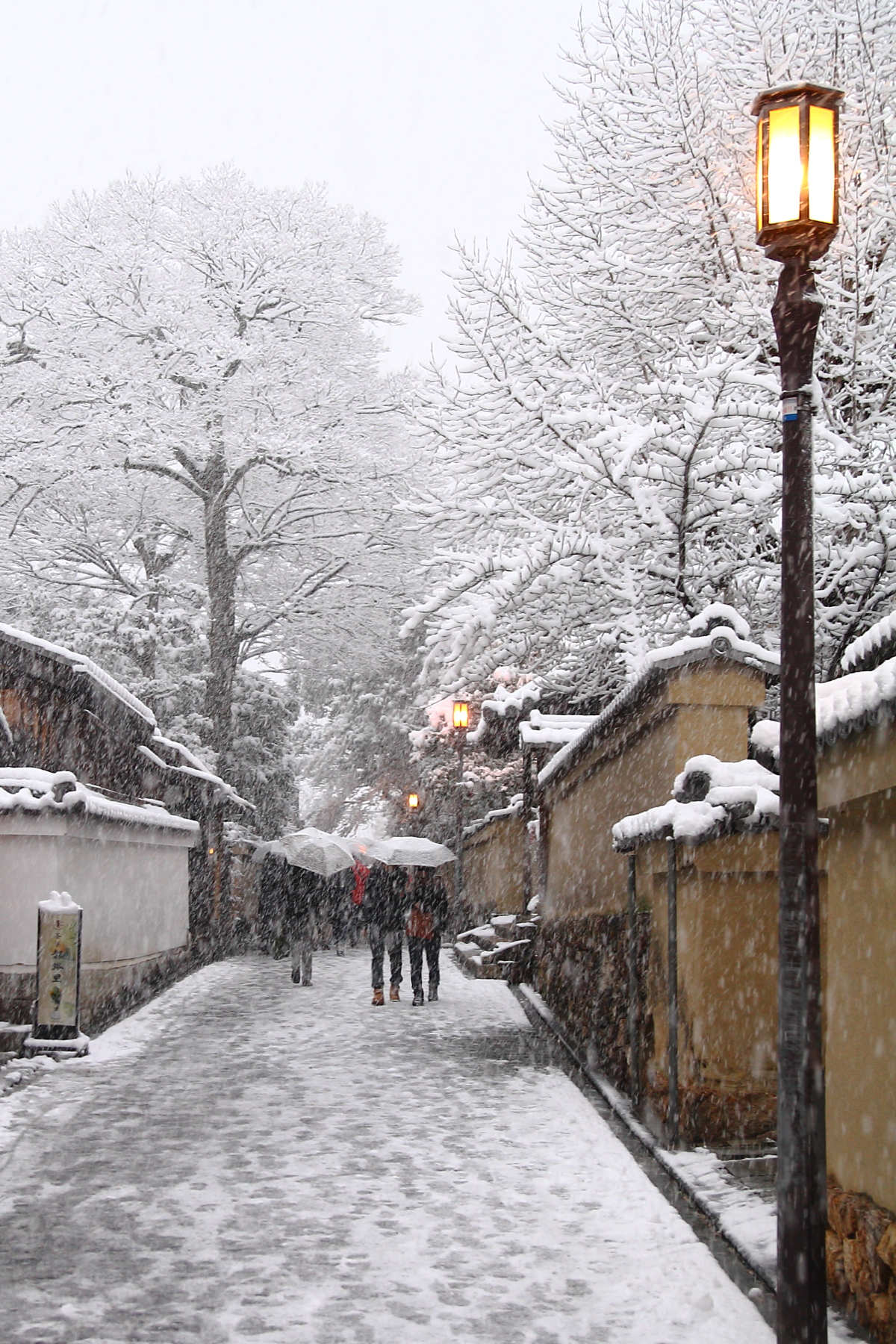 Kyoto in the Snow - The street lights come on