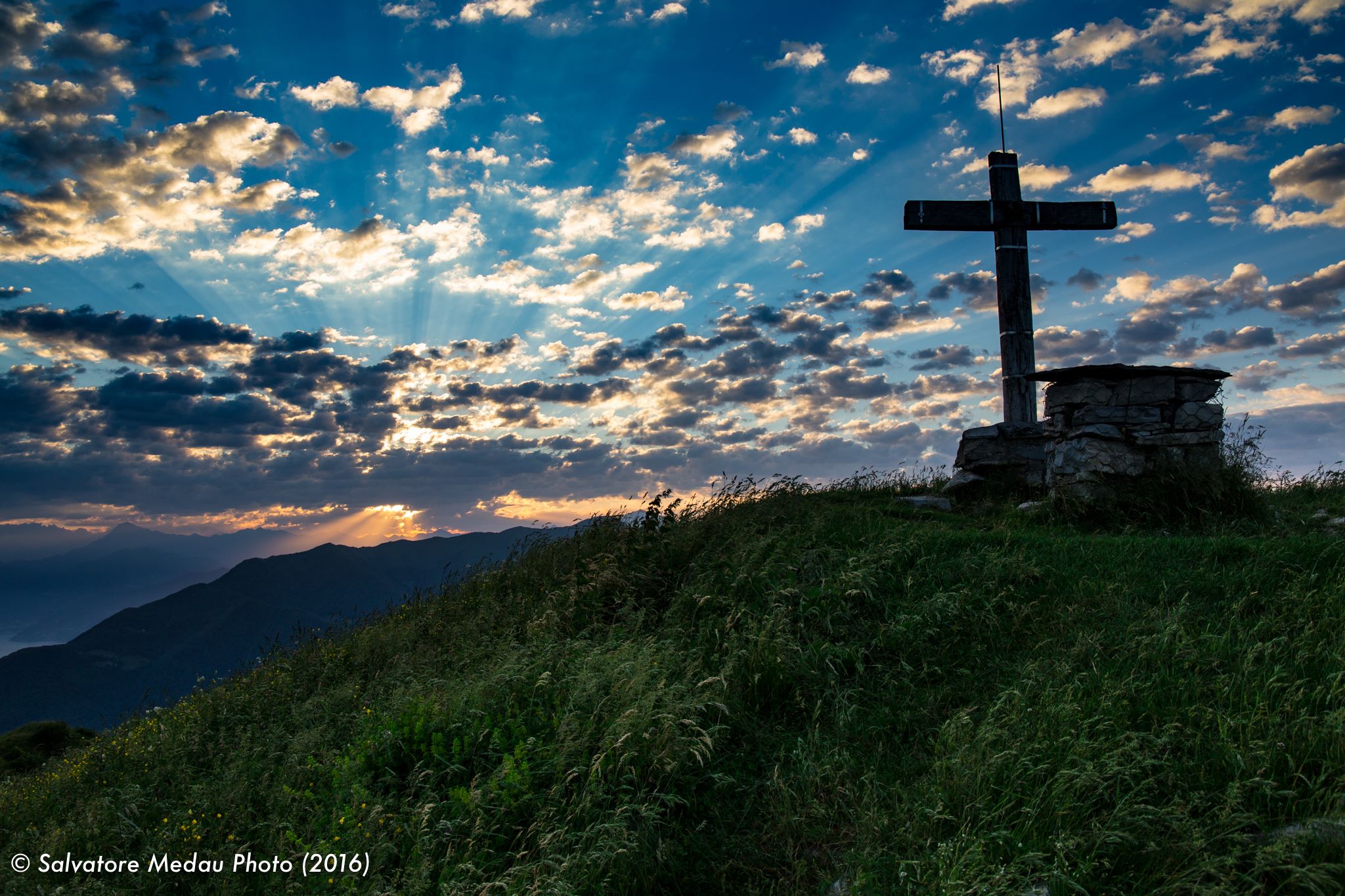 Sunrise on the summit of Mount Colmegnone