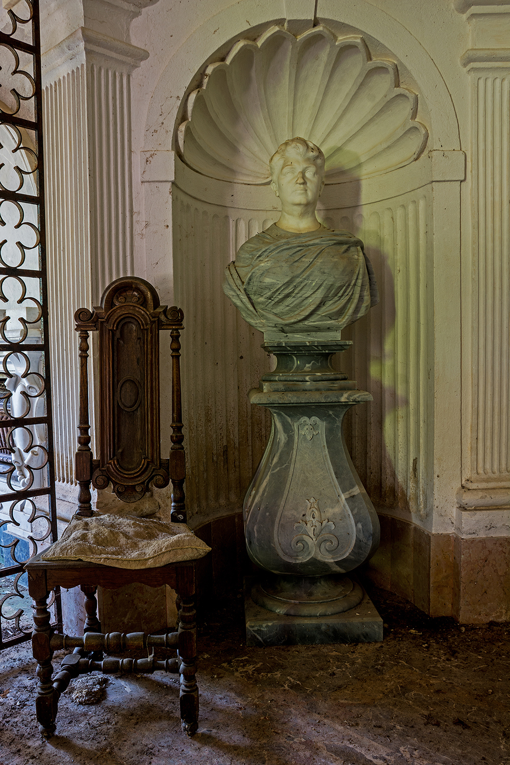 The bust and the chair