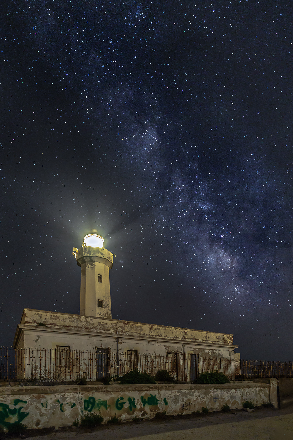 Lighthouse and milky way