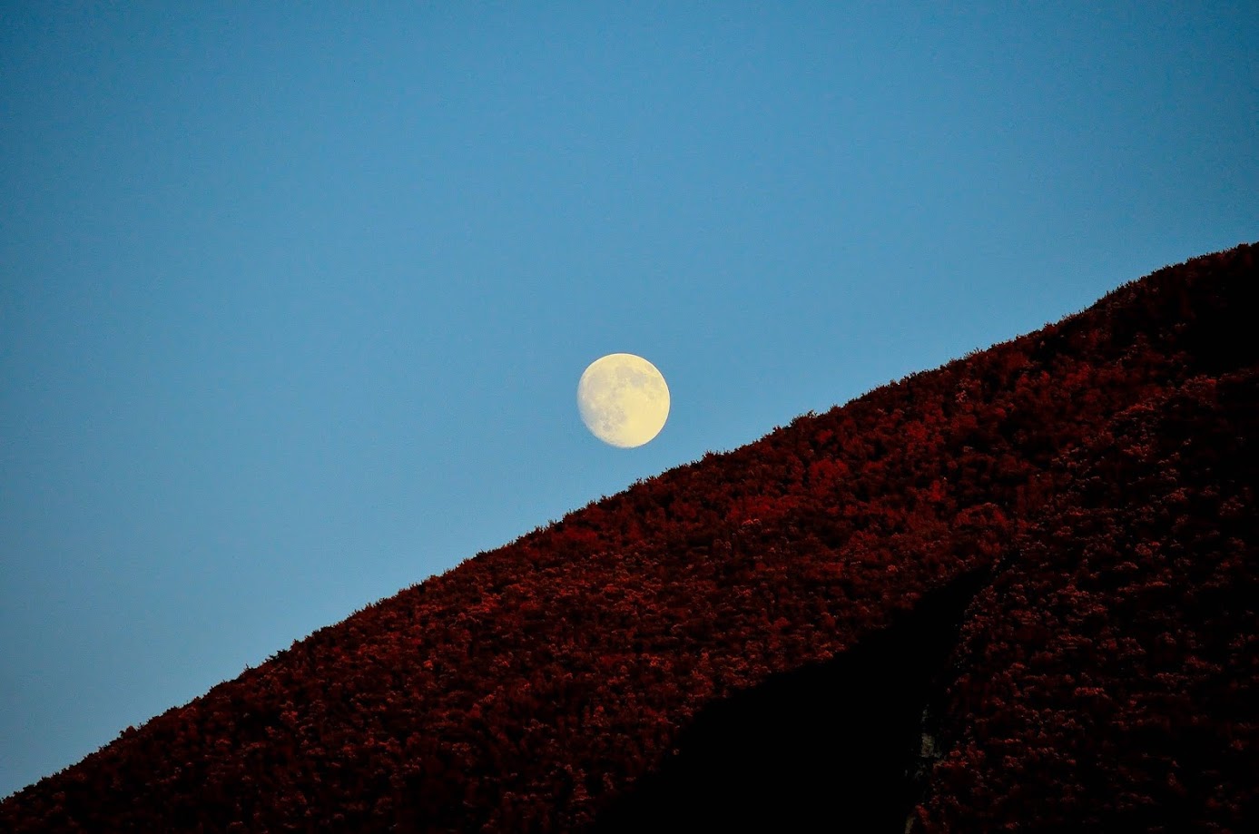 The moon comes from the mountain