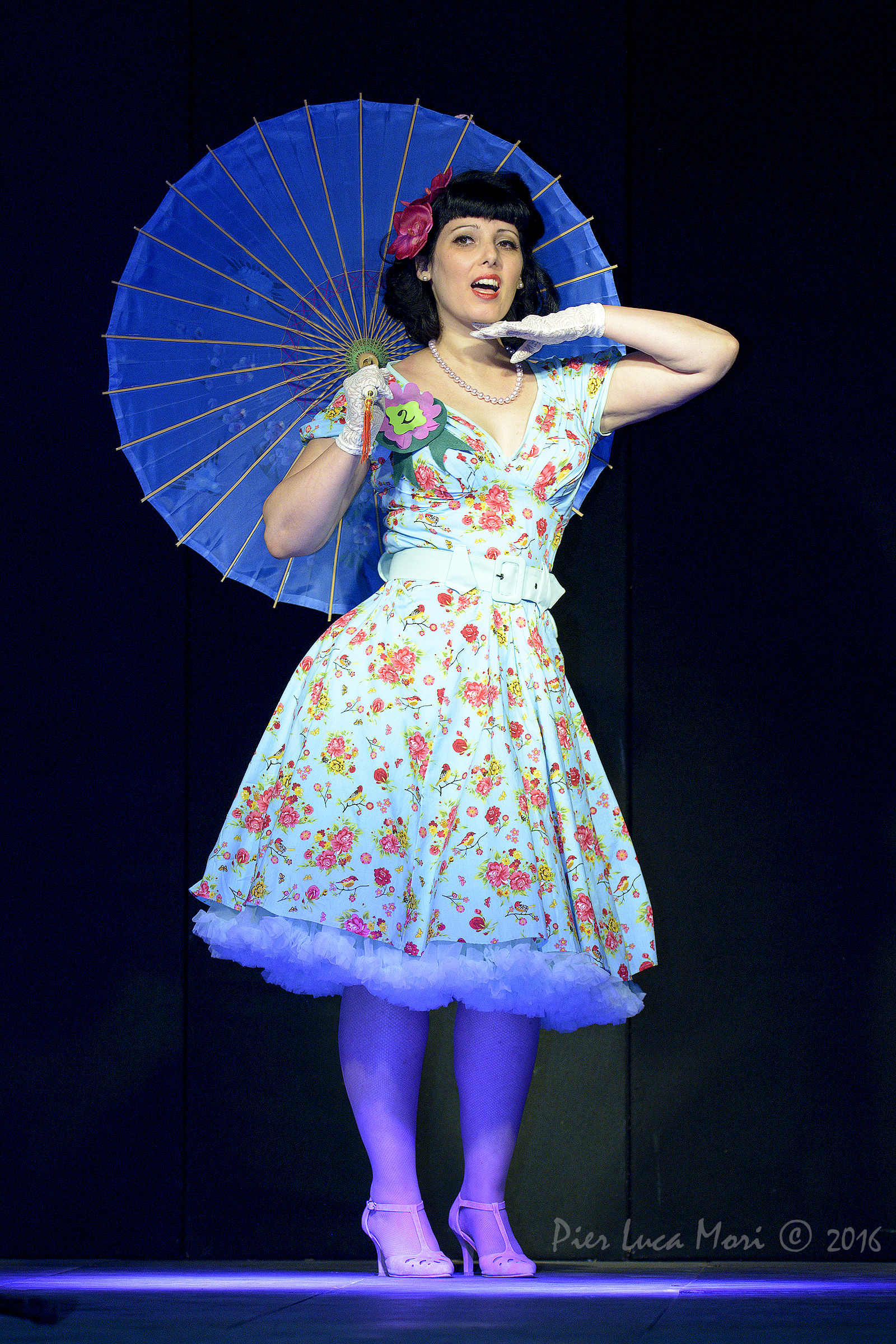 On the catwalk with umbrella