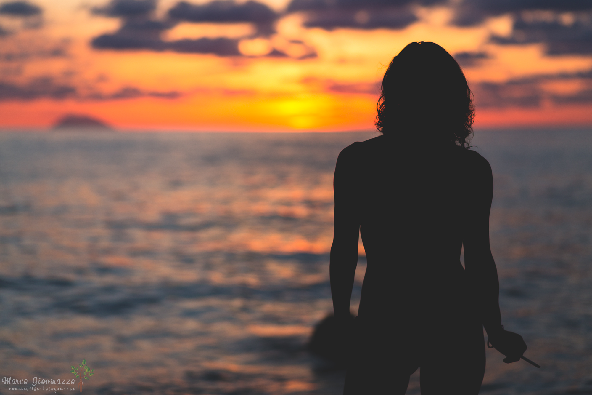 a cigarette at sunset