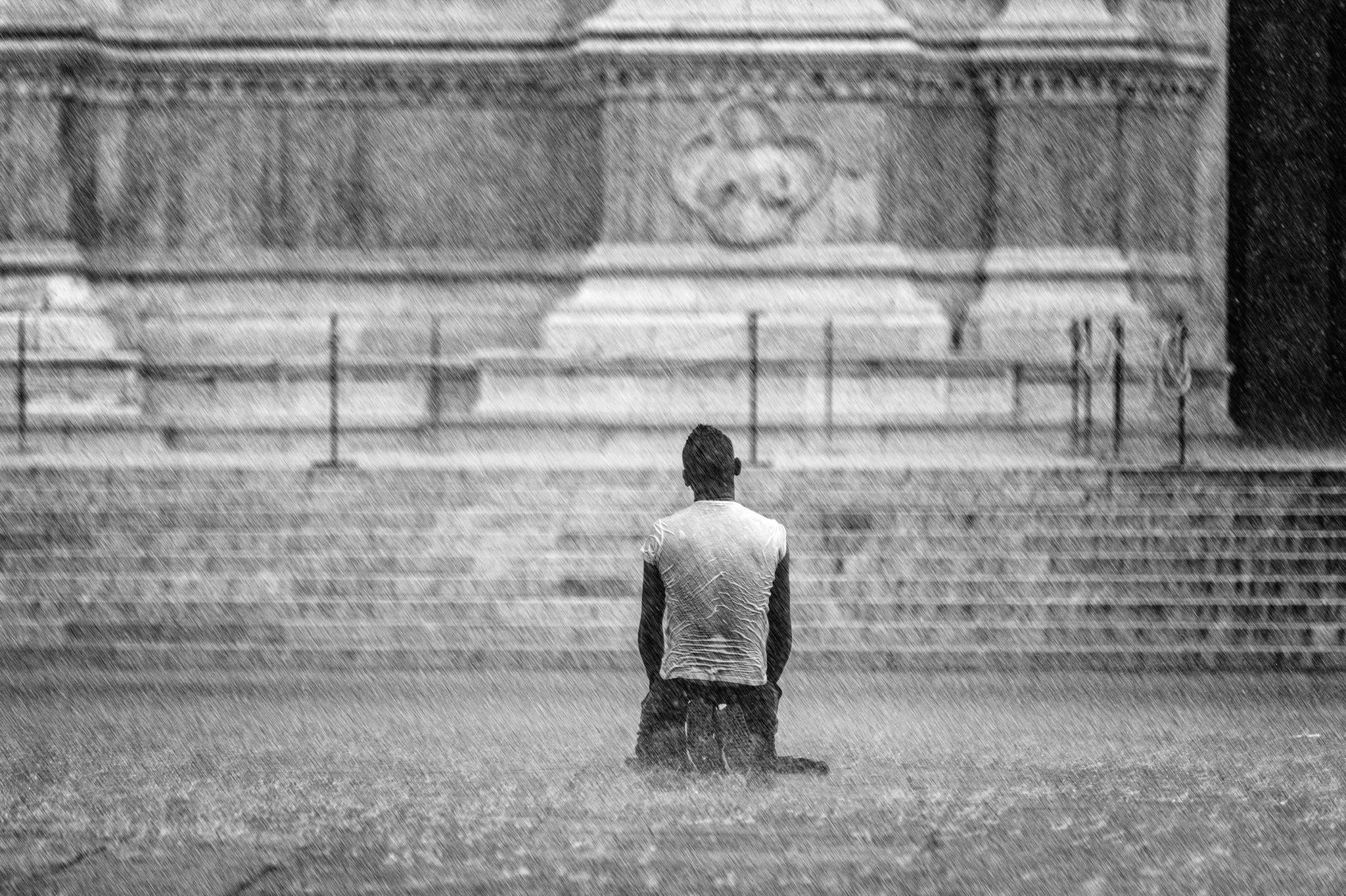 Praying in the rain