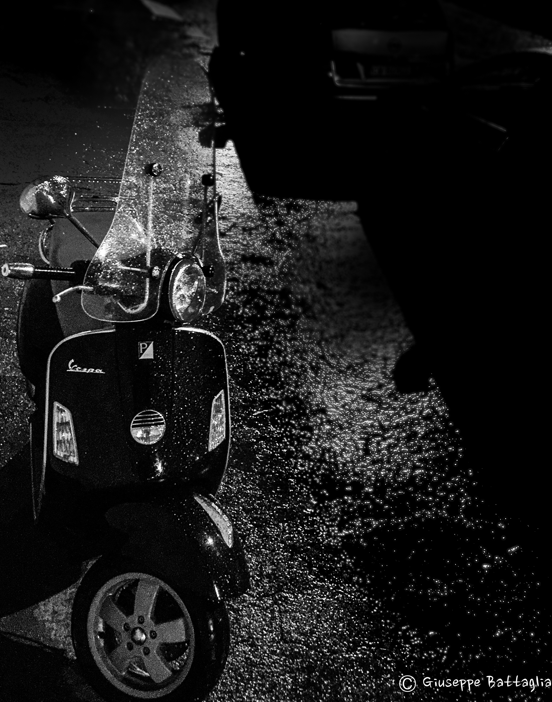 Vespa sotto la Pioggia