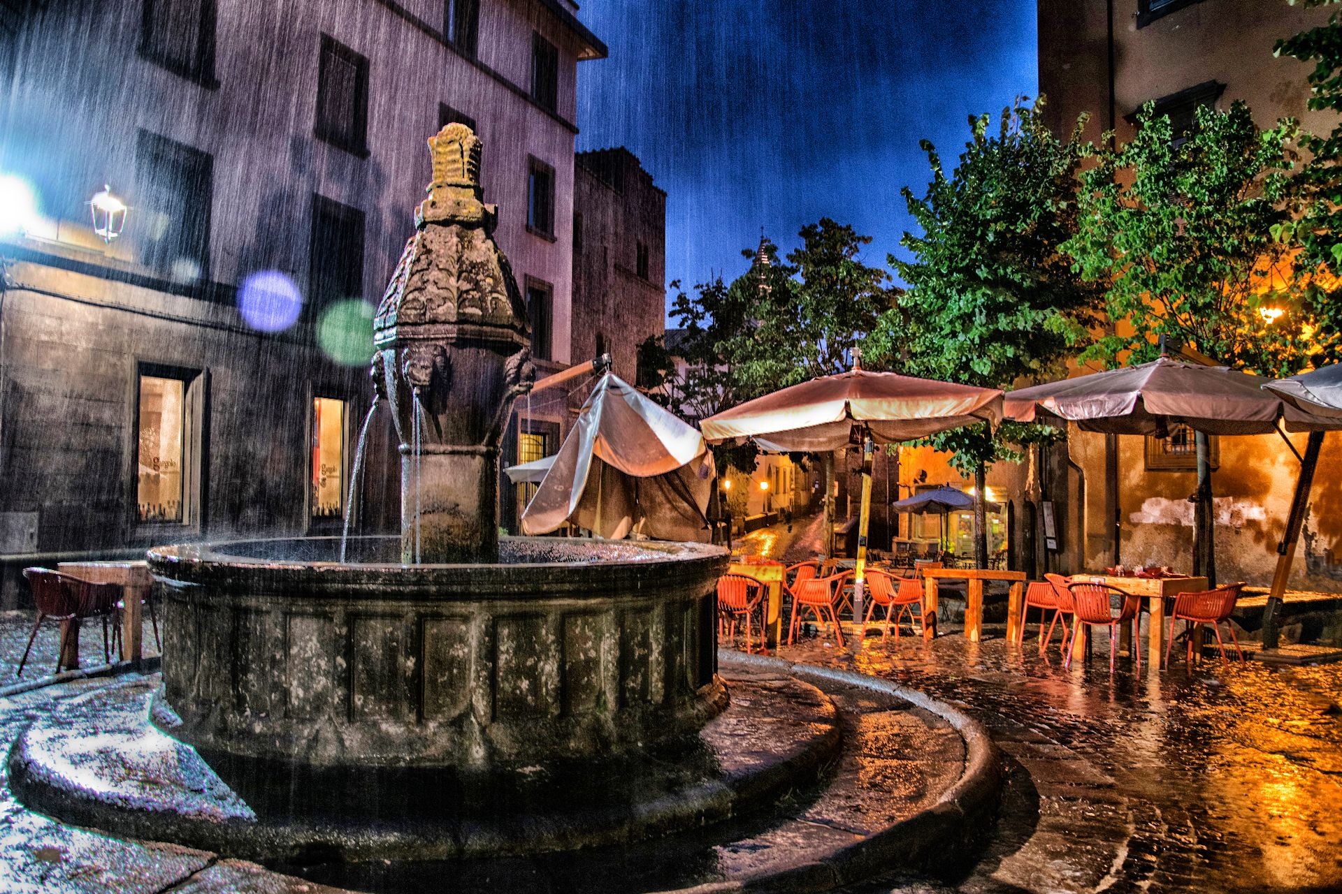 Under pouring rain at sunset