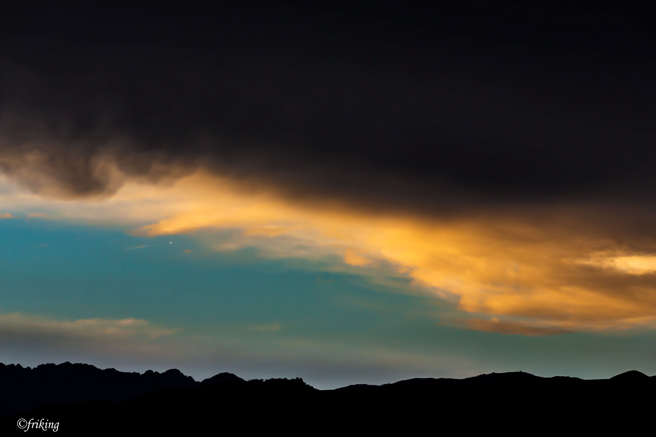 Threatening clouds over Magnano in Riviera
