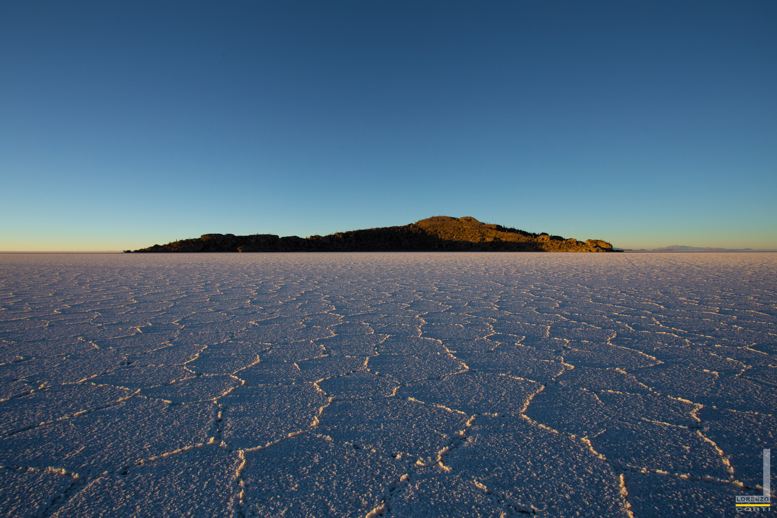 Sunrise on the Salar de Uyuni with views of the Isla Incahua...