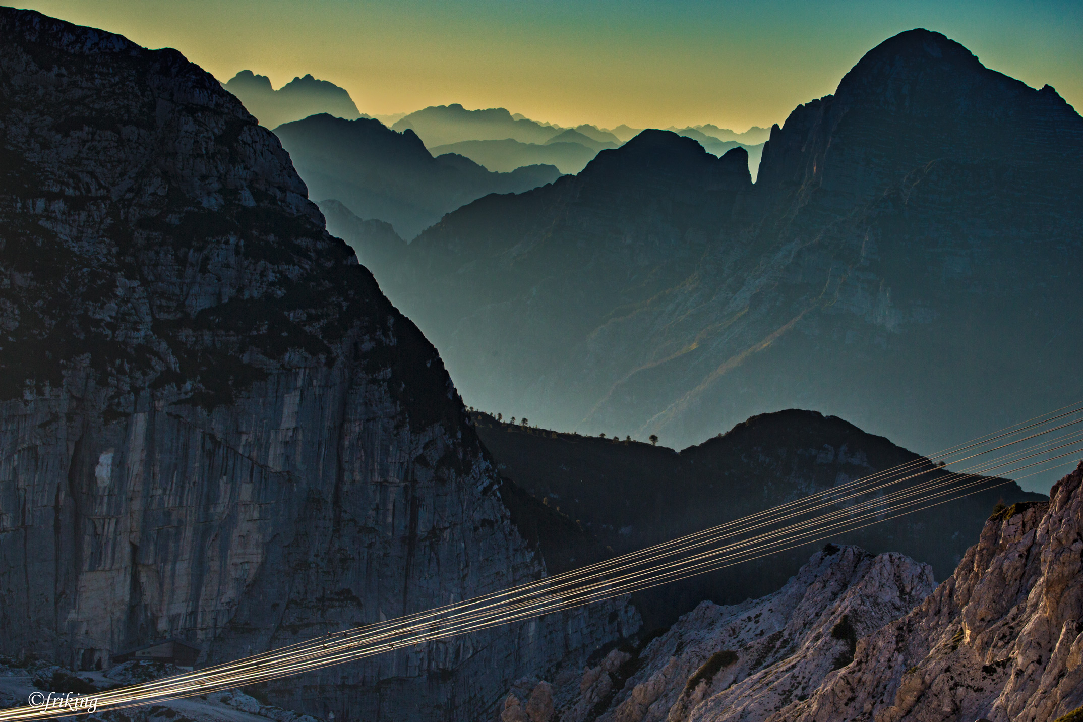 golden wires in front of the Plateau of Montasio