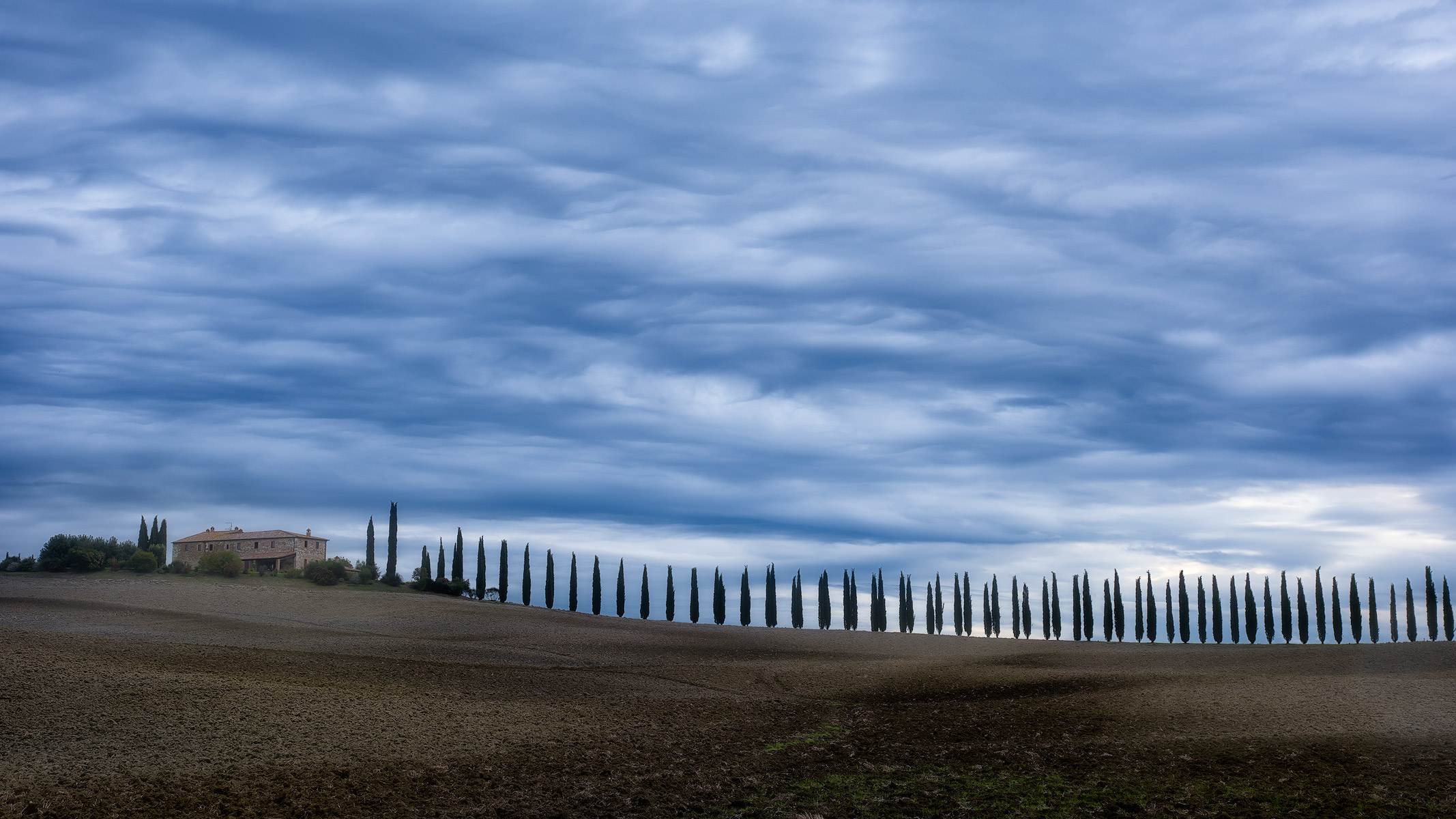 Under the blue clouds