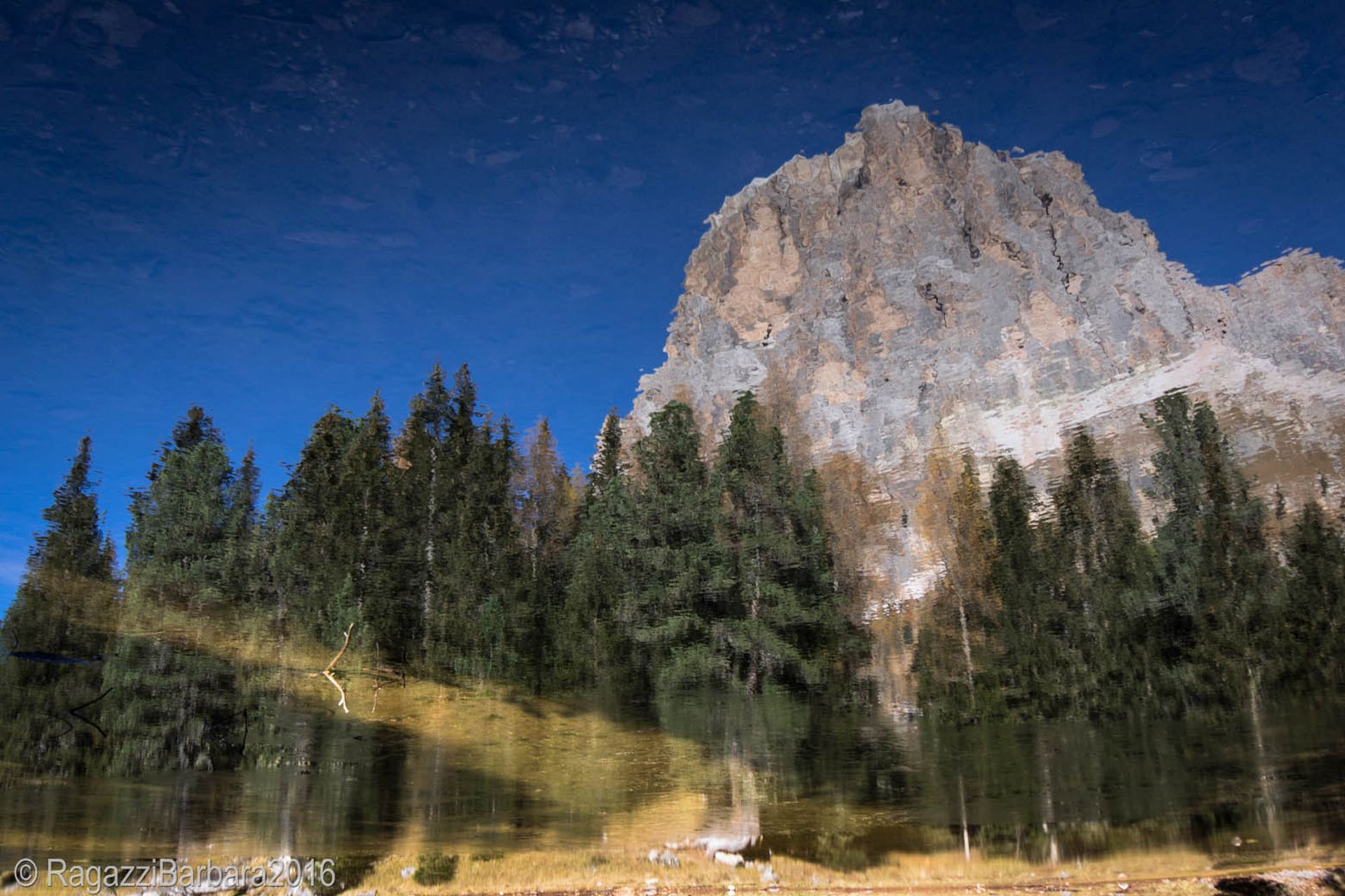 The Antelao is reflected in Lake Bai de Dones