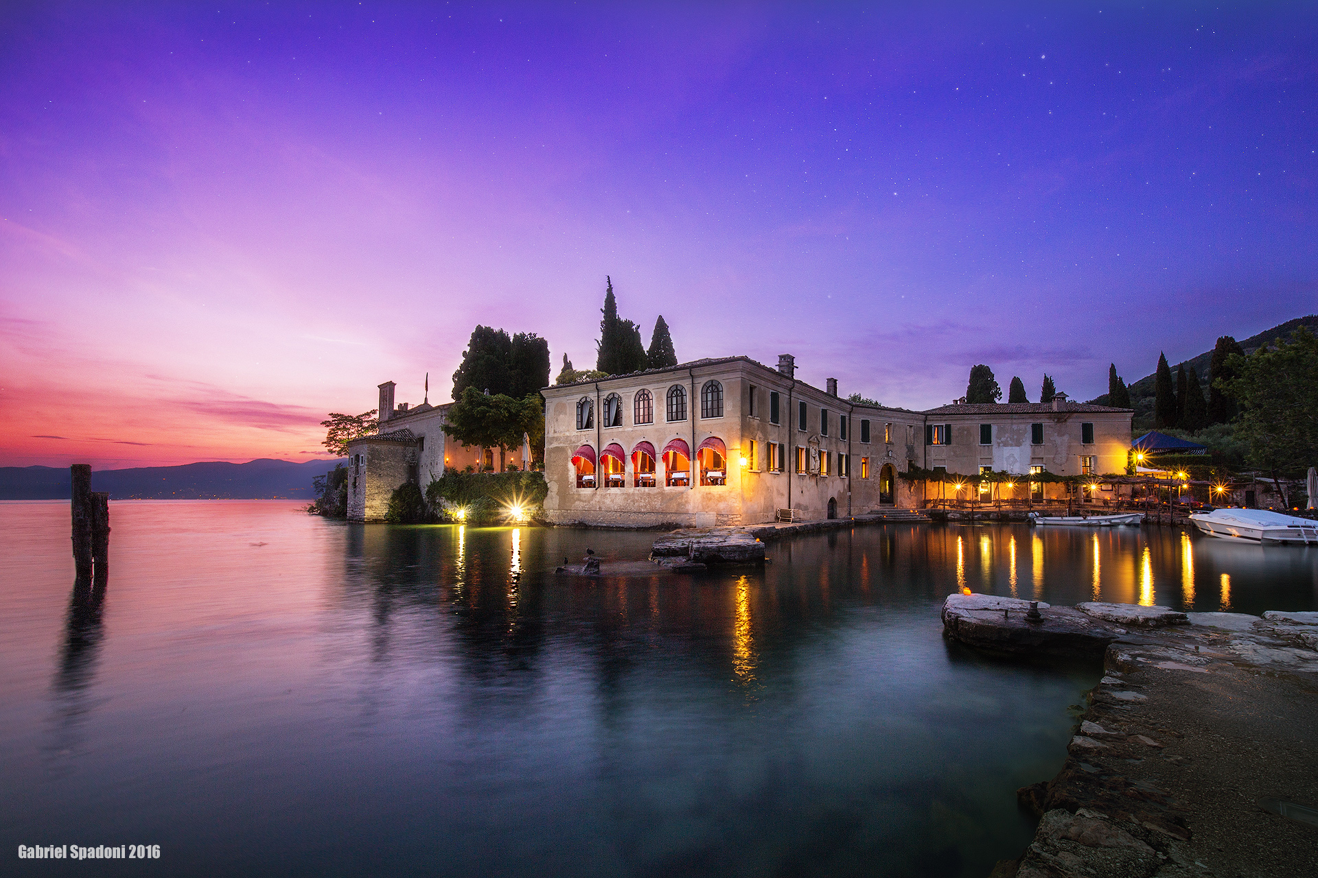 The villa on the lake at sunset