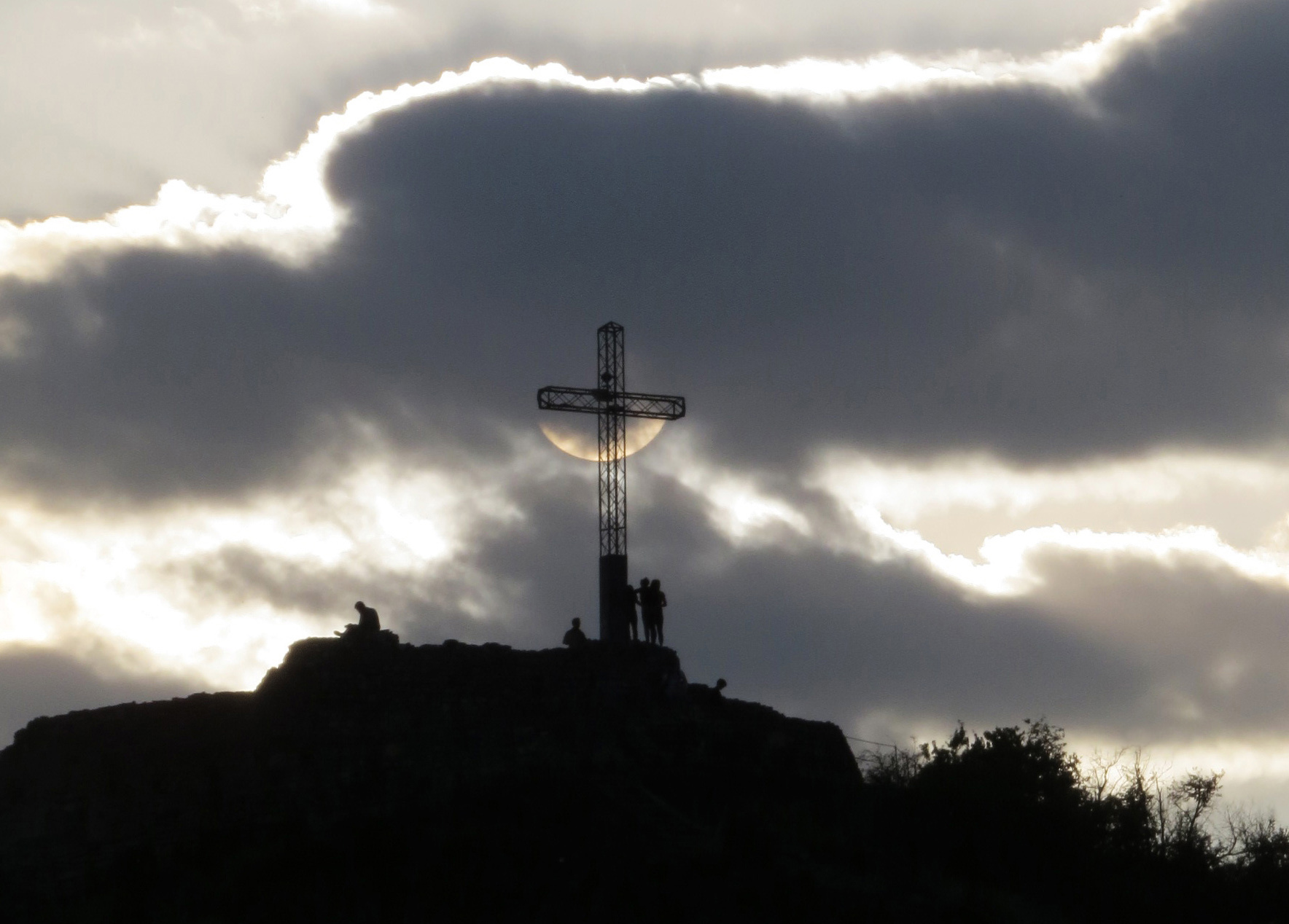 The Sun behind the Cross