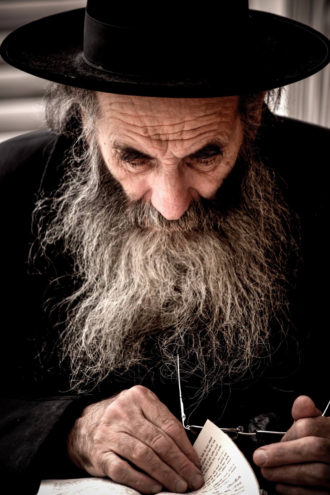 man at western wall during shabbat