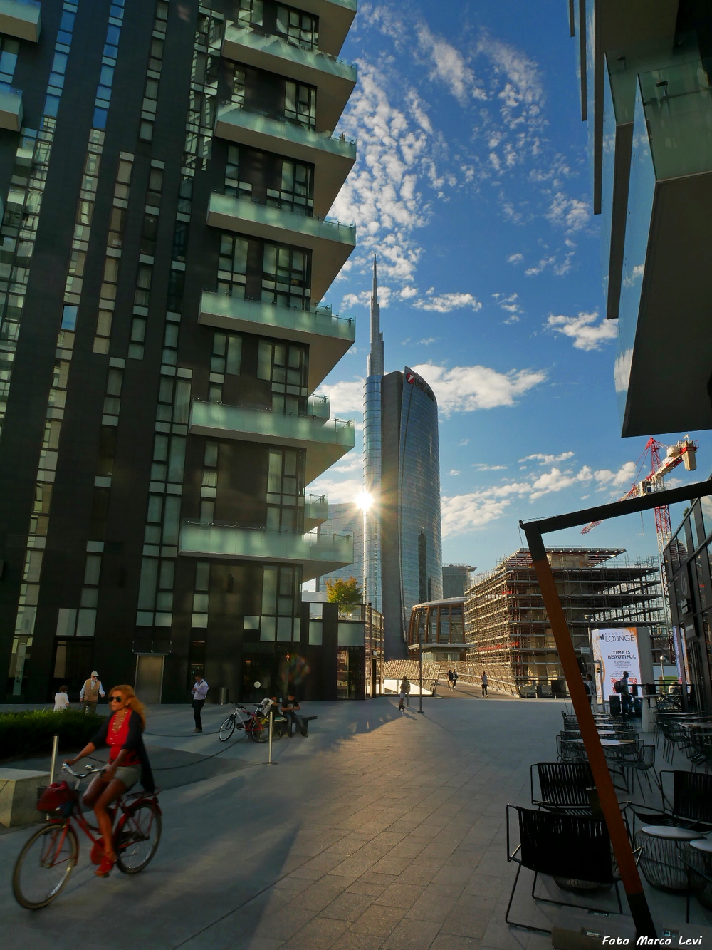 Turning bike between skyscrapers