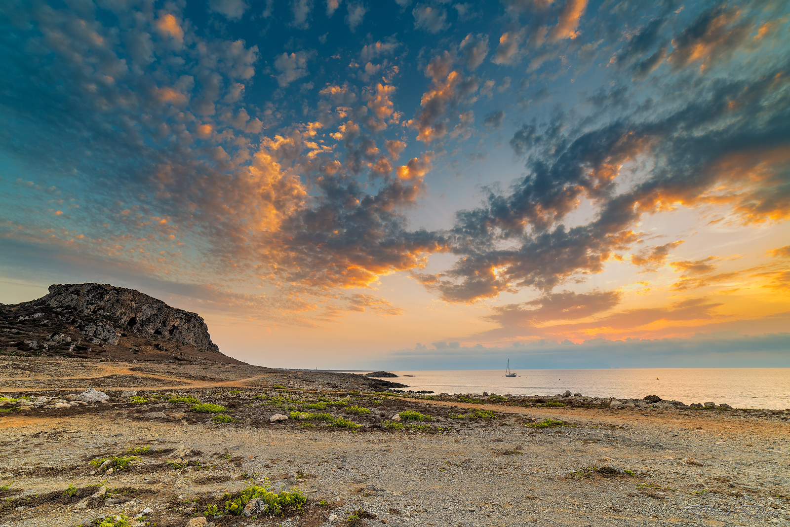 Cala Faraglioni al tramonto