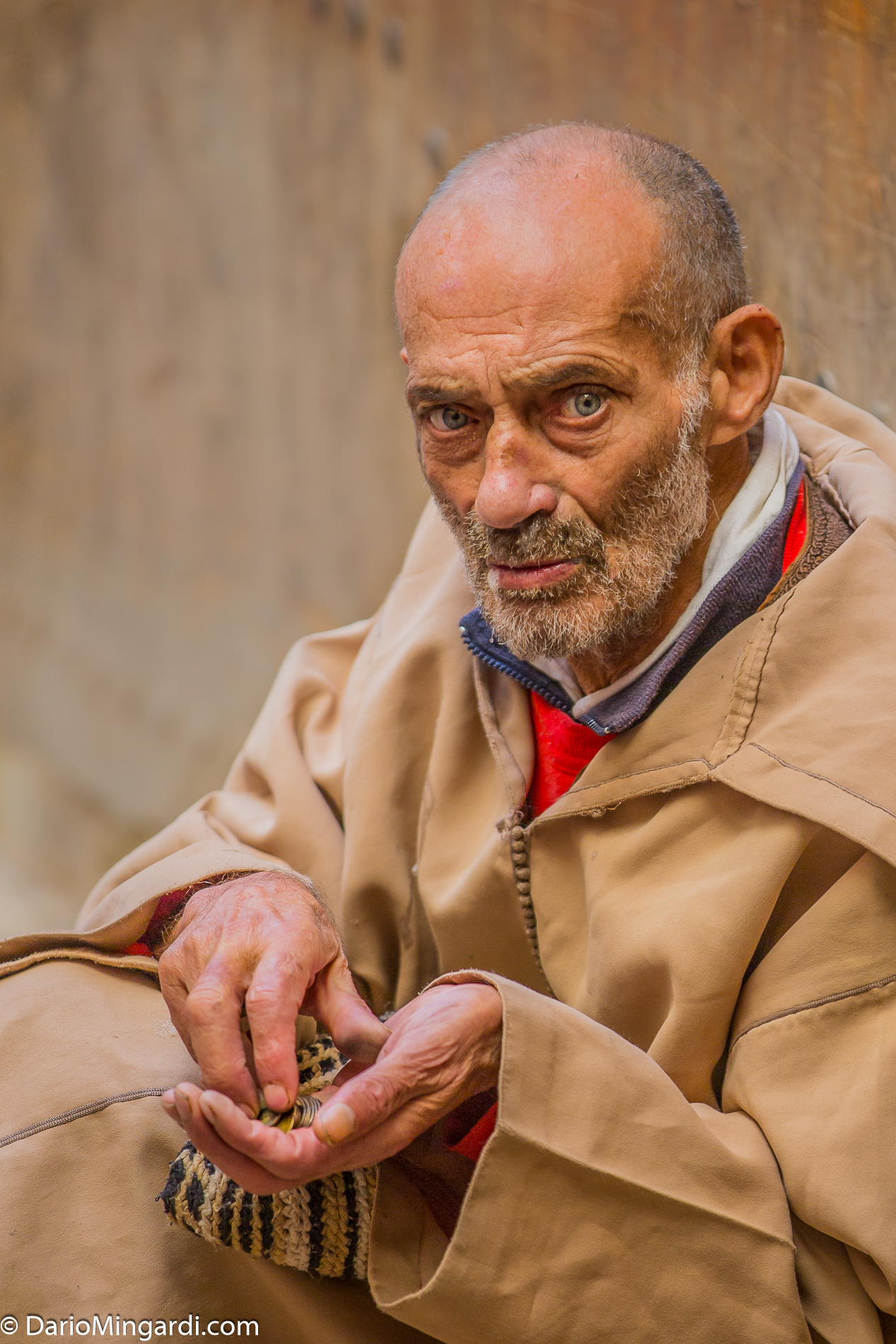 Fes beggar with sghei