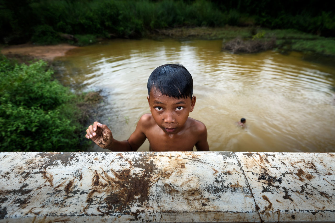 Kids diving in the river, Cambodia