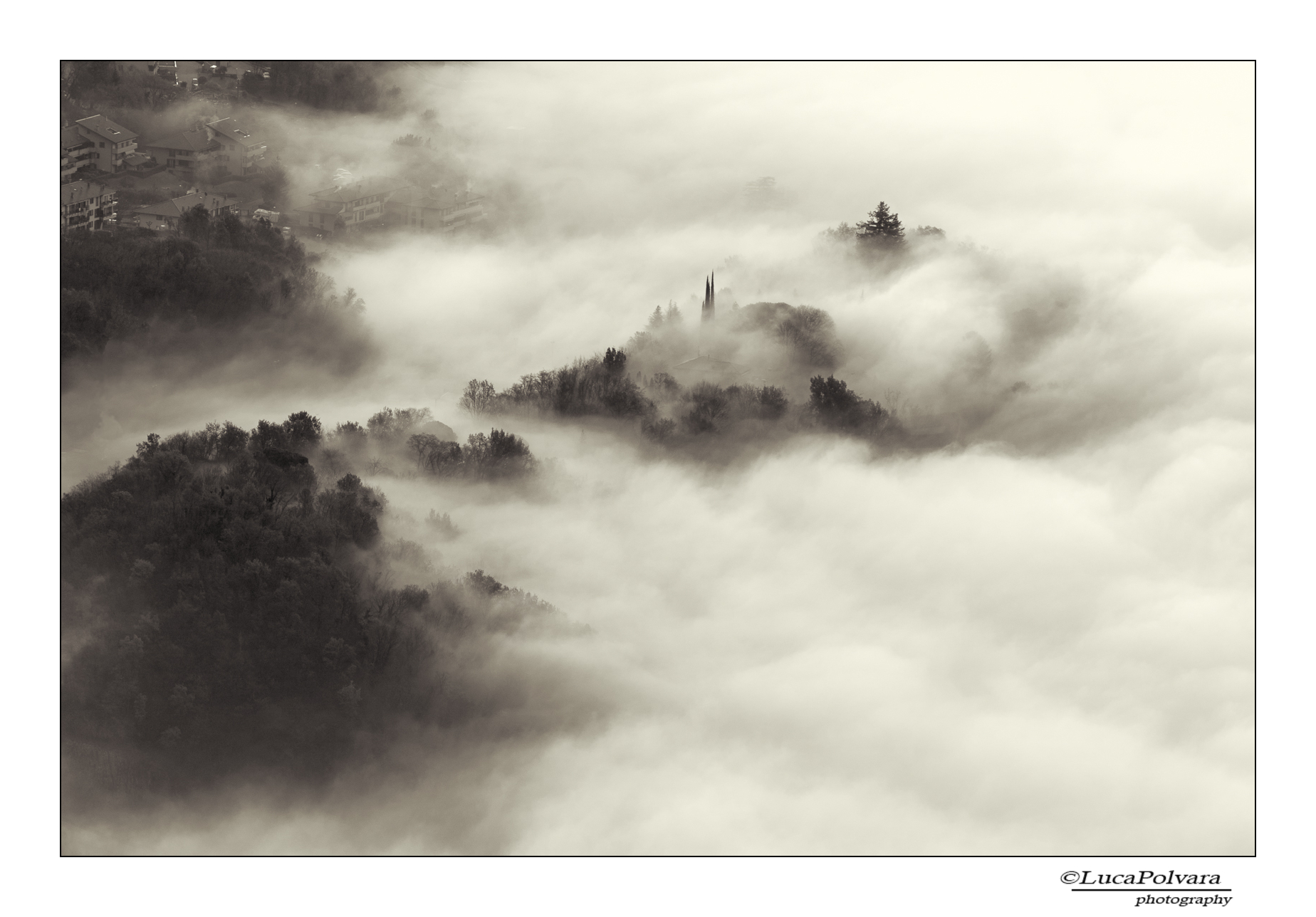 The Mist rises to steep hills ..