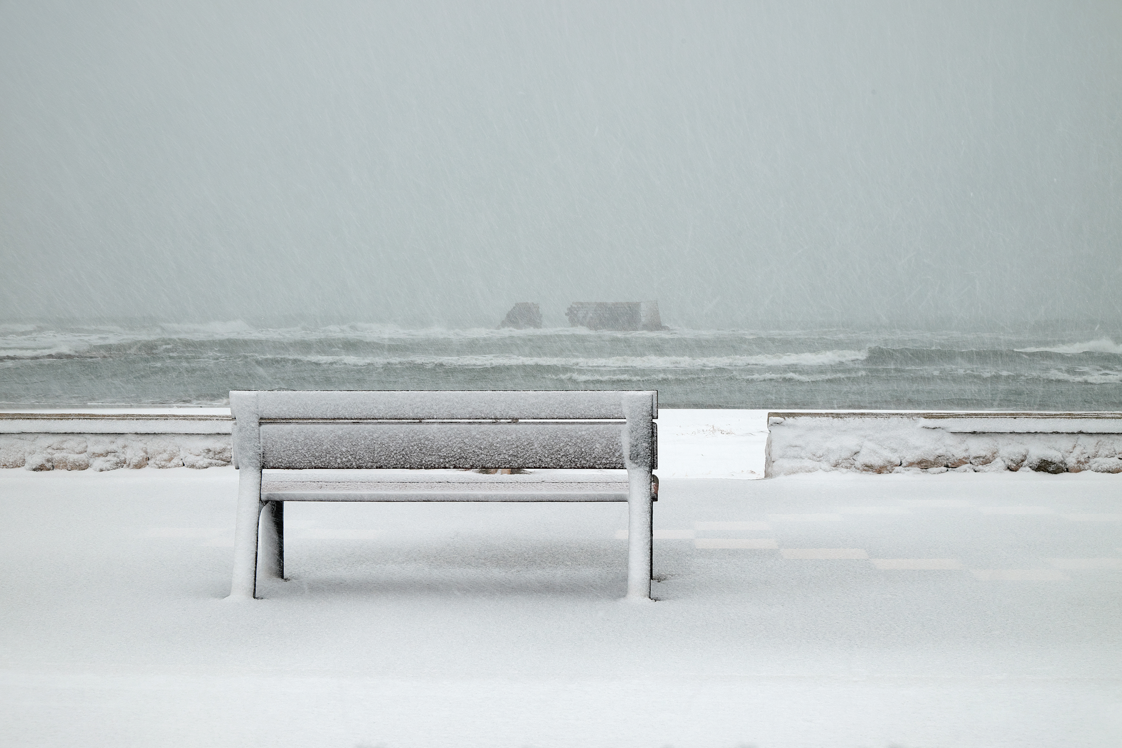 bench sea and snow