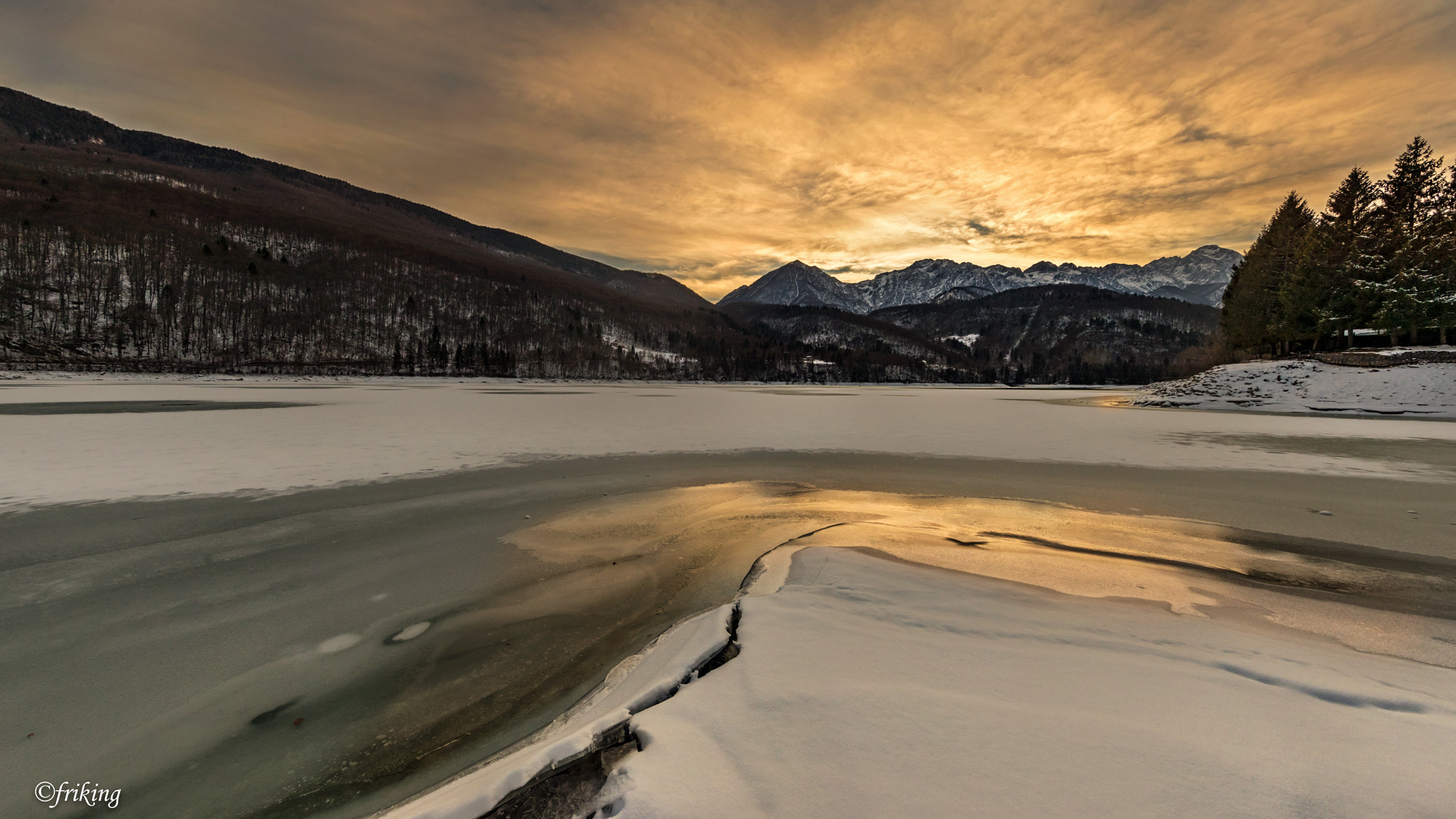 Barcis Lake ice at sunset