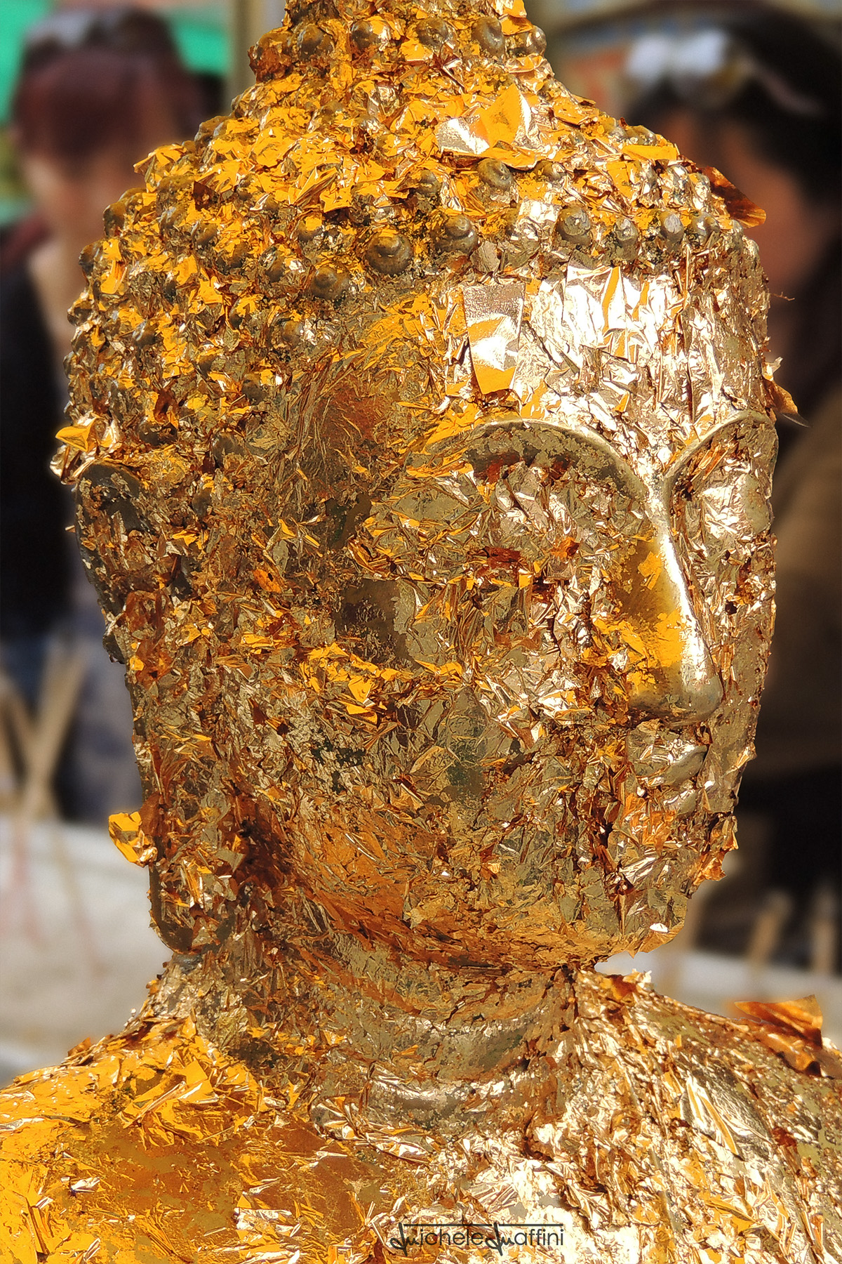 Thailand - Buddha covered with gold leaves