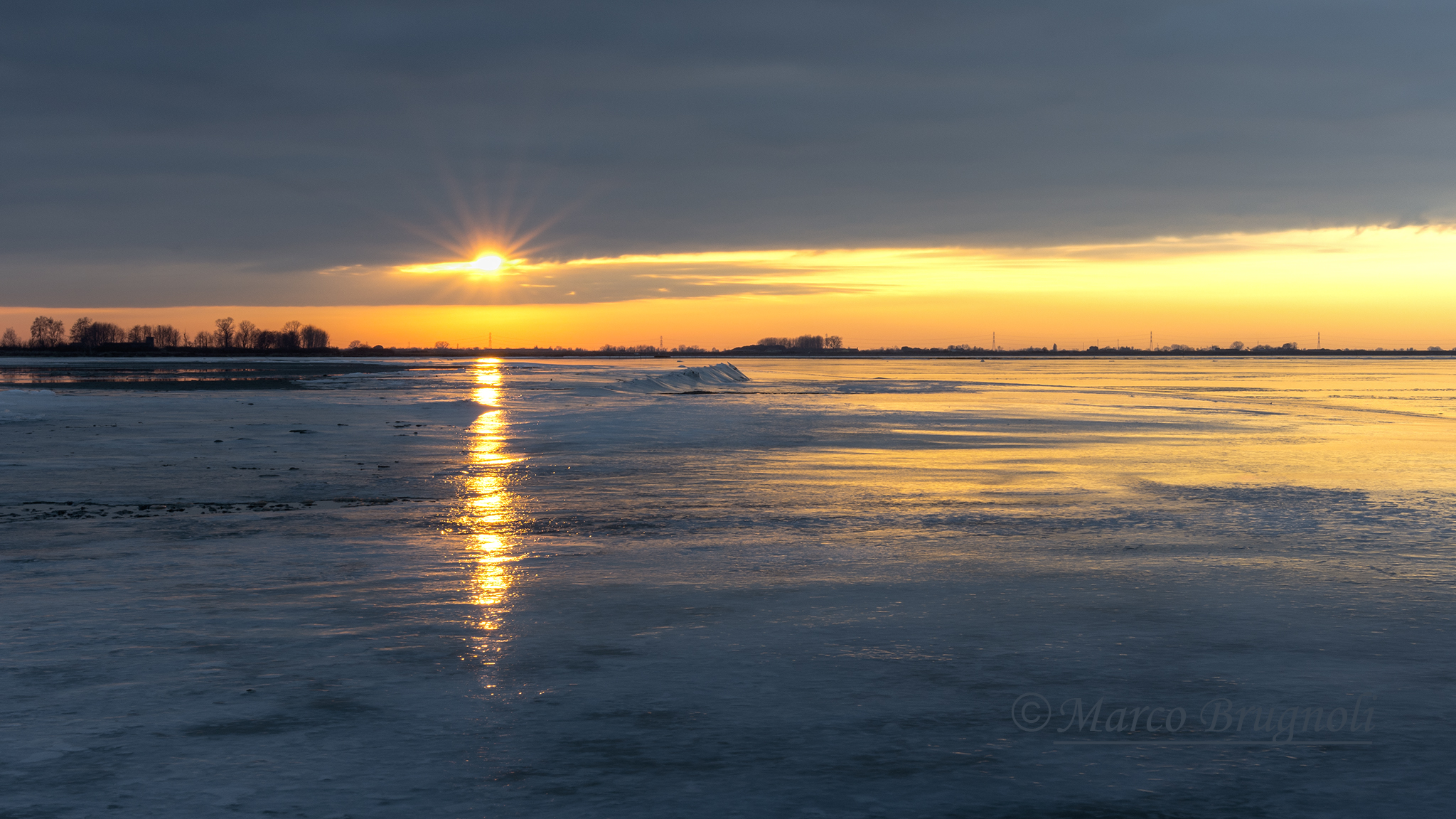 Unusual Sunset on the frozen lagoon.