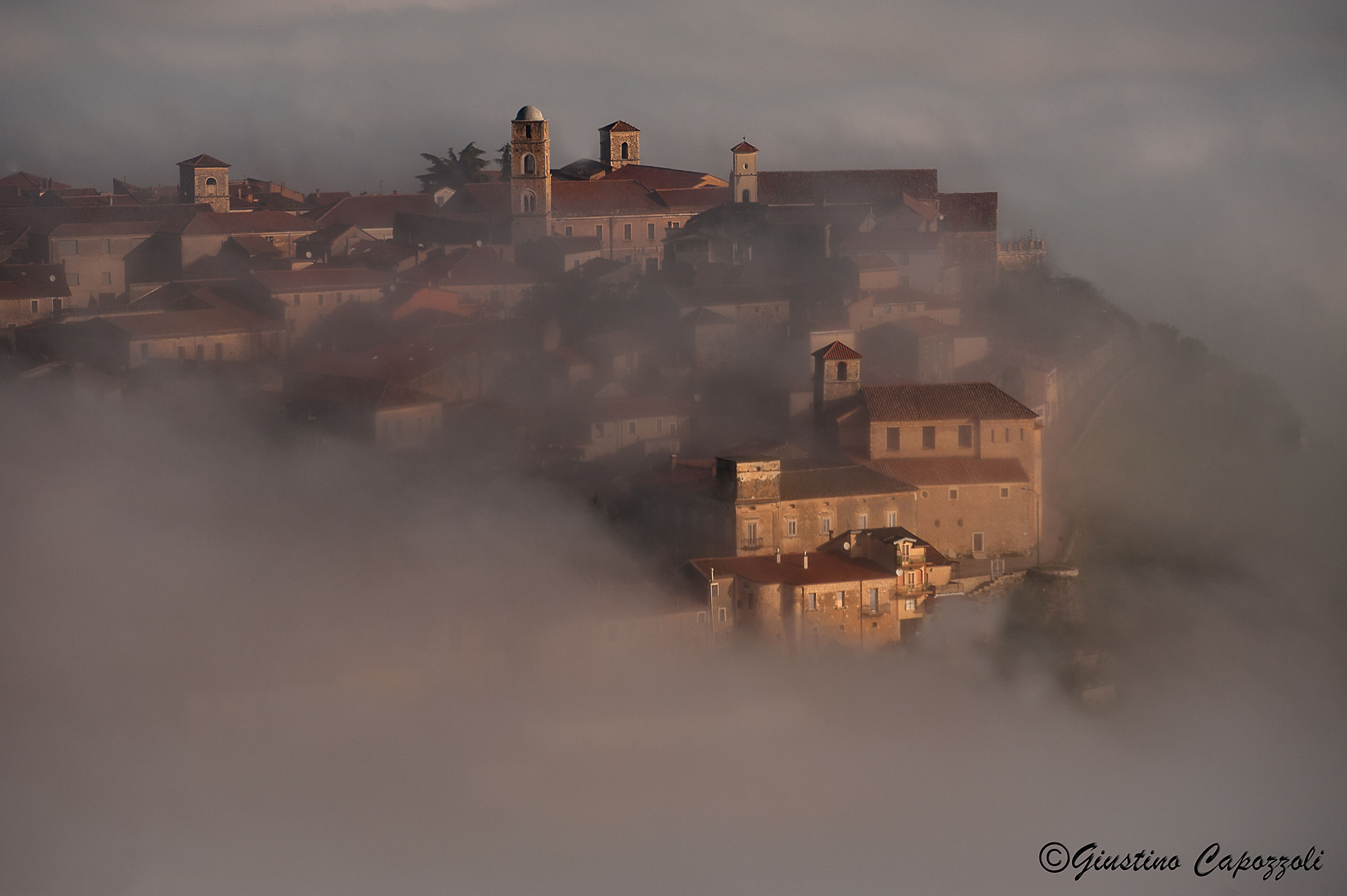 Teggiano bell in the fog.