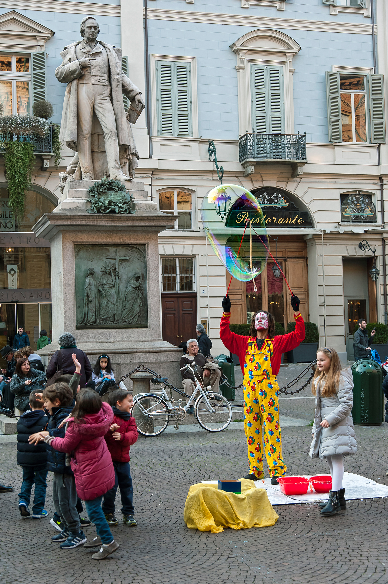 playful moment in Piazza Carignano