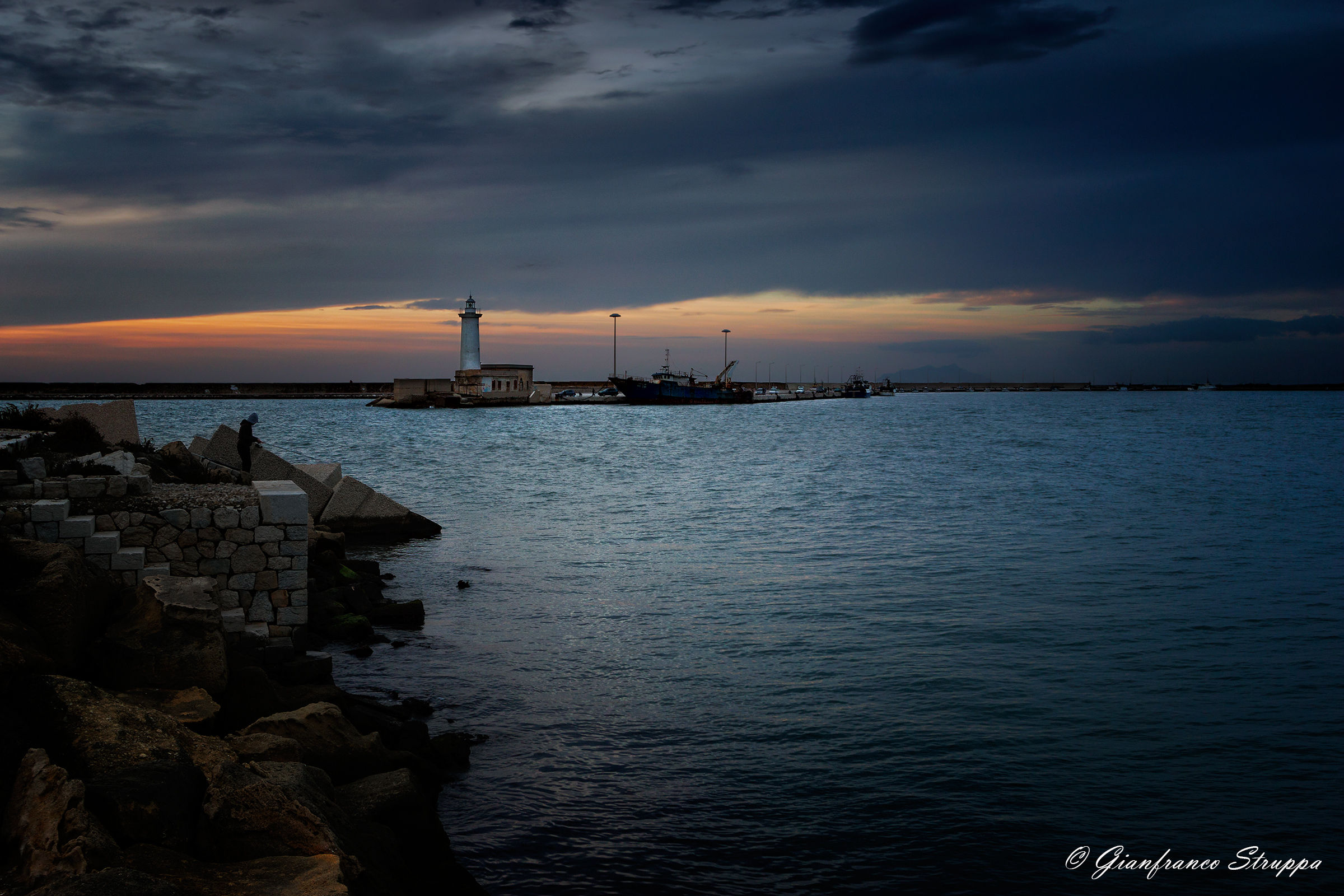 The lighthouse and the fisherman