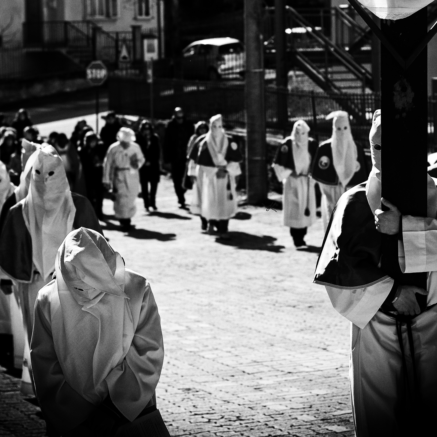 procession of hooded