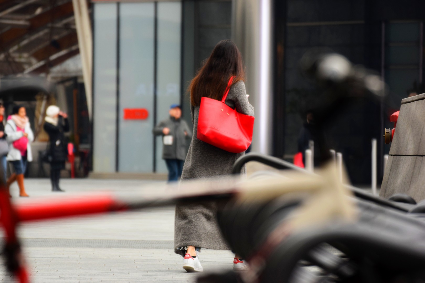 The girl with the red bag