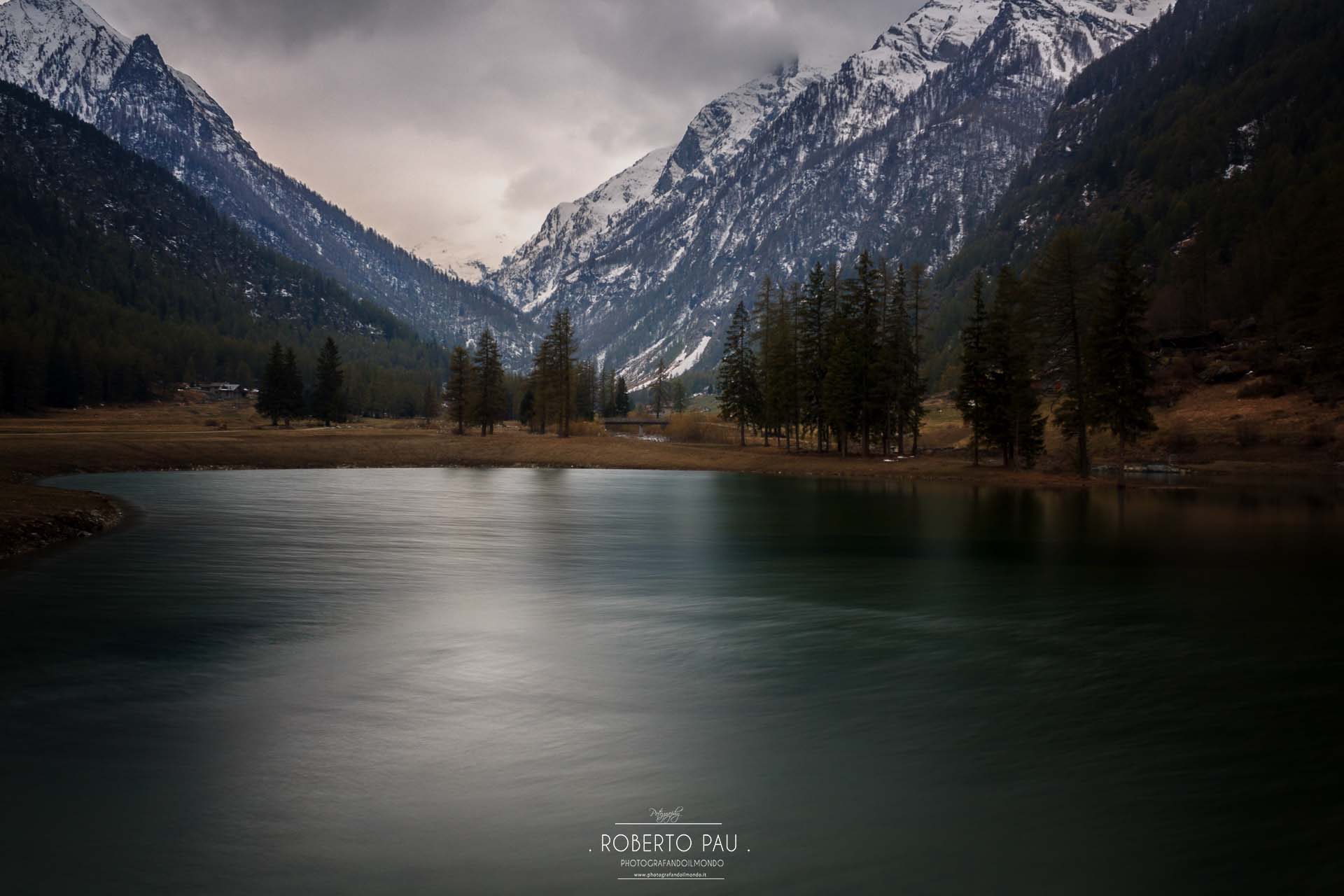 Lake Clavalité immortalized on a cloudy day.