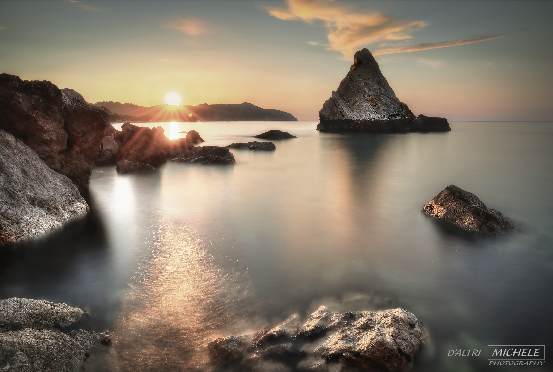 tramonto scoglio della vela